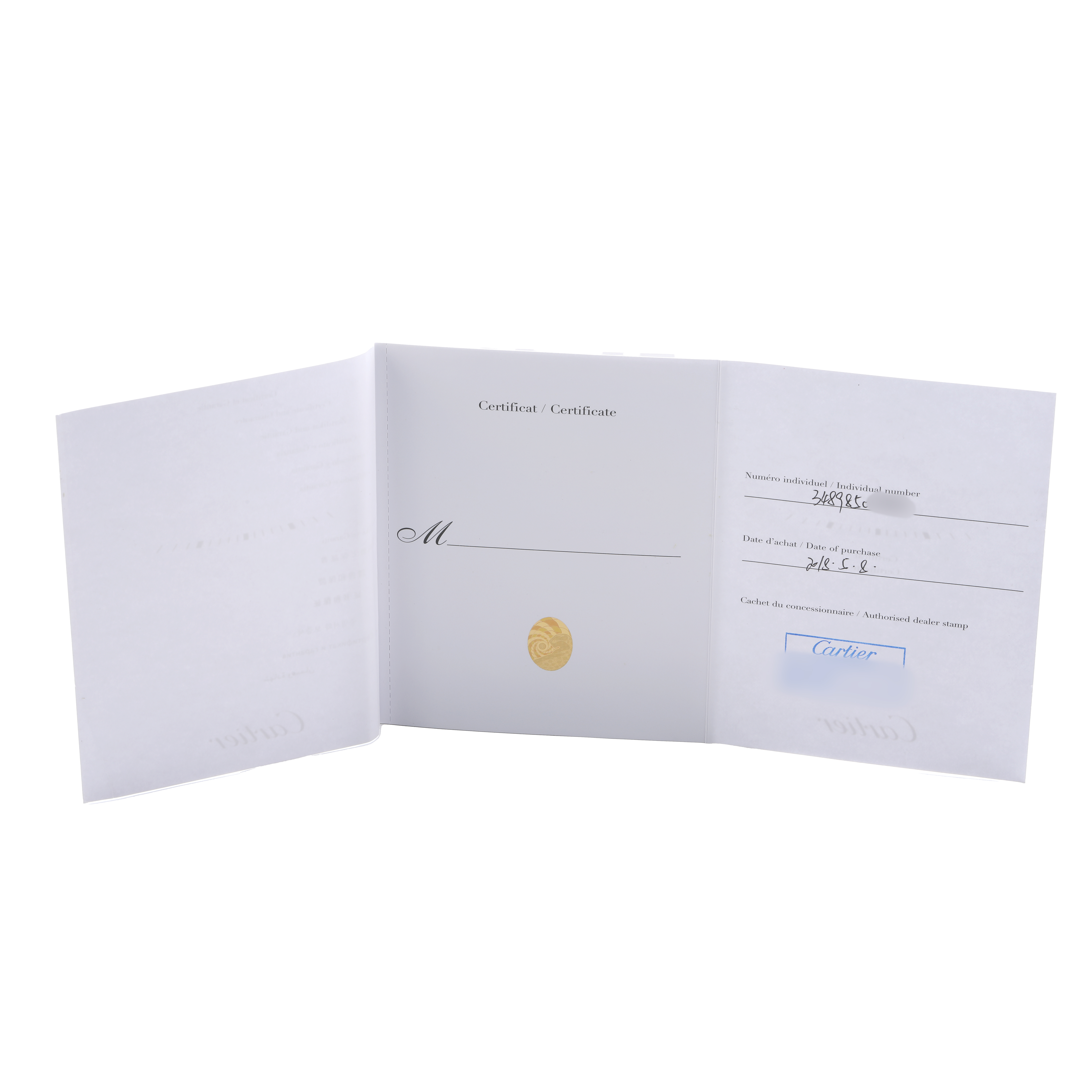 The image shows an open booklet with a certificate for a Ballon Bleu model by Cartier, featuring signatures and a stamp.