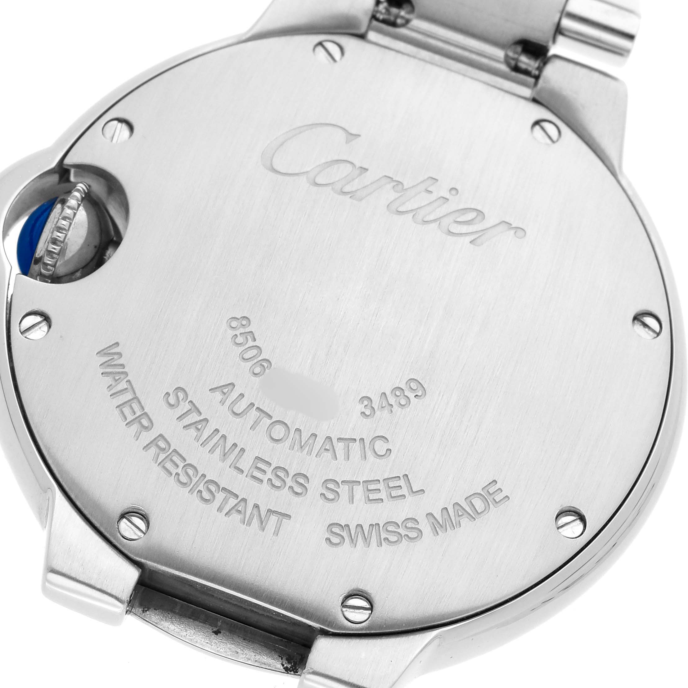 The image shows the back of a Cartier Ballon Bleu W4BB0016 Women's Stainless Steel Silver Dial watch, highlighting the case back's engraving and crown.