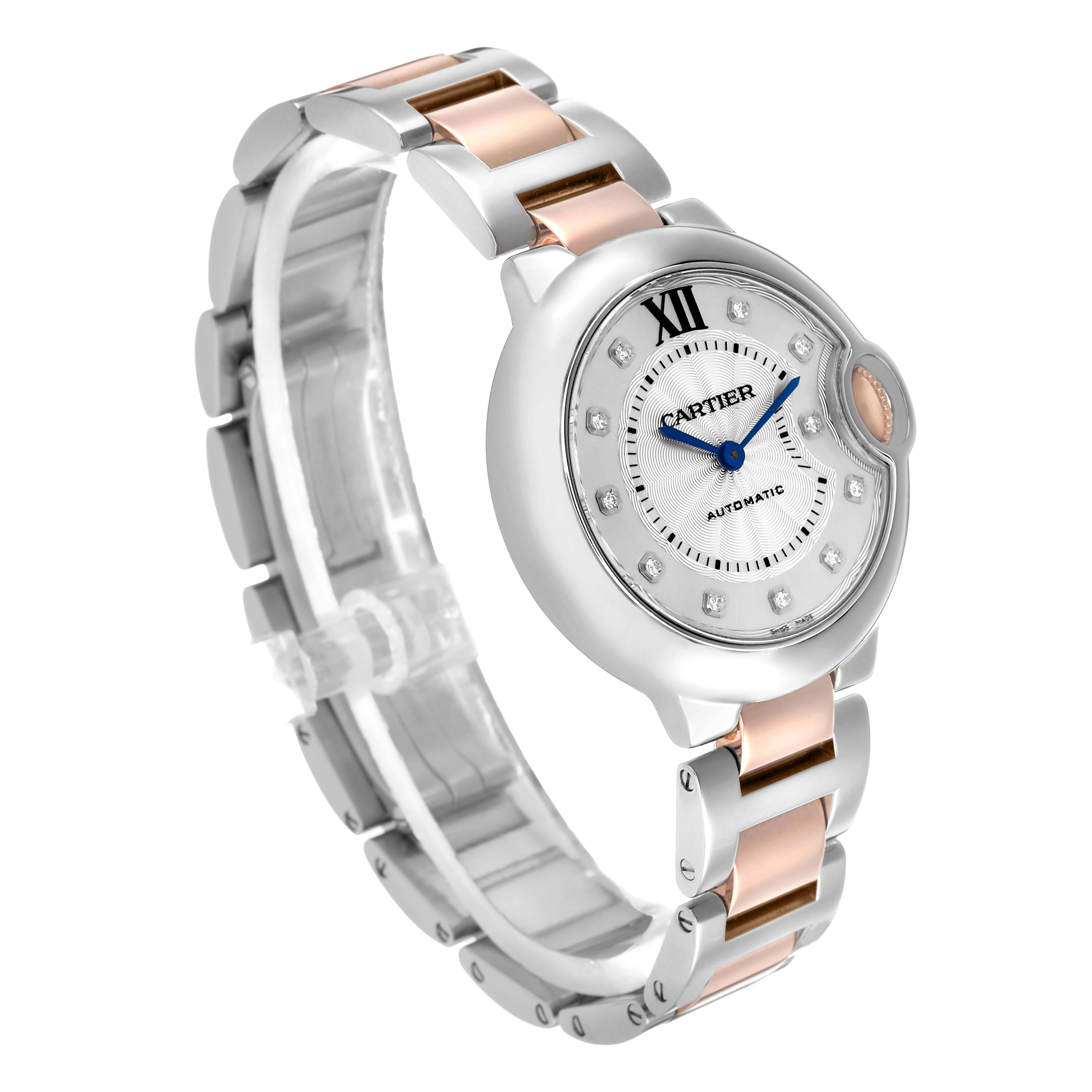 The Cartier Ballon Bleu WE902044 Women
s Stainless Steel Silver Dial watch is shown at a slight angle, highlighting its rose gold and silver strap and distinctive crown guard.
