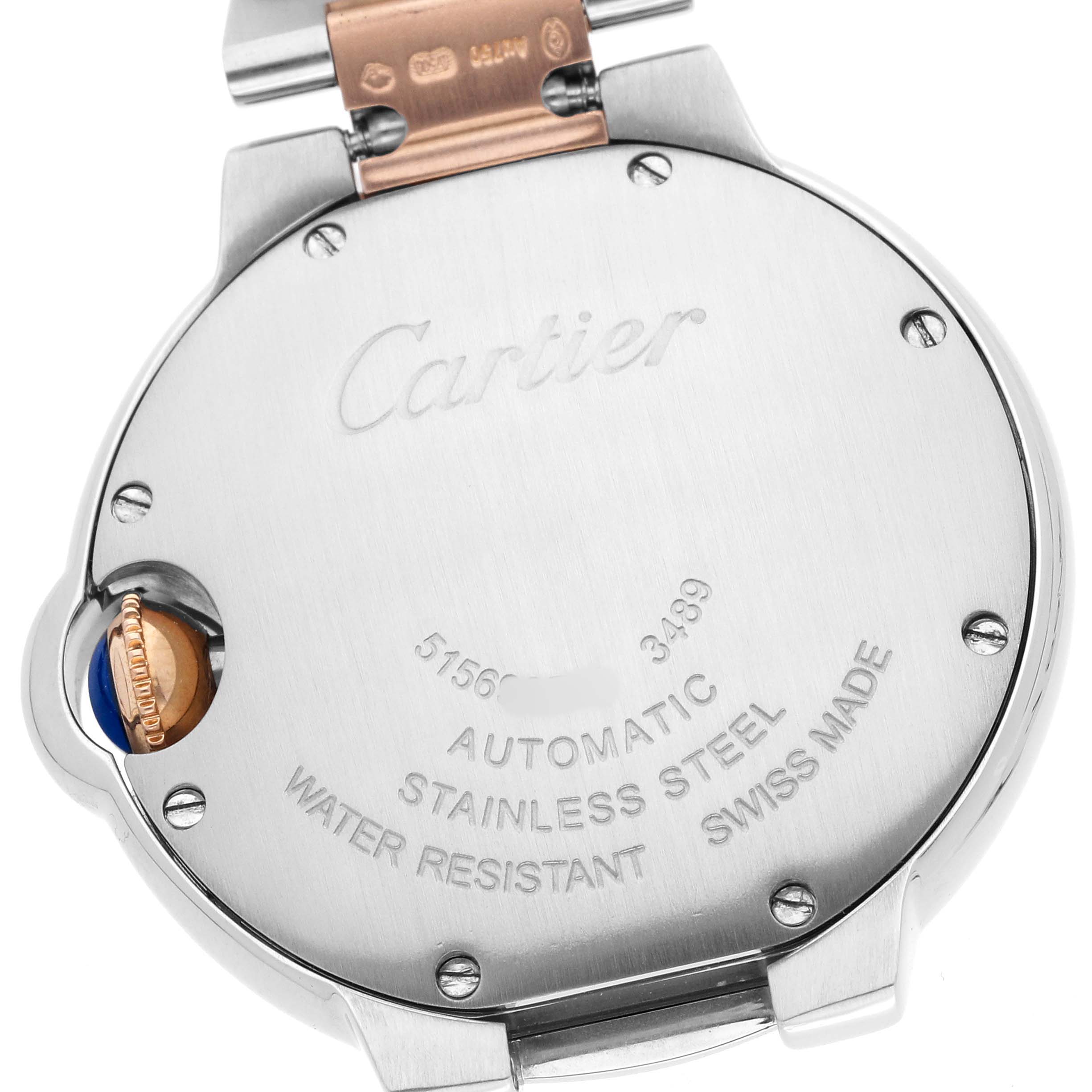 The image shows the back of a Cartier Ballon Bleu WE902044 Women's Stainless Steel Silver Dial watch, highlighting the metal case and engravings.