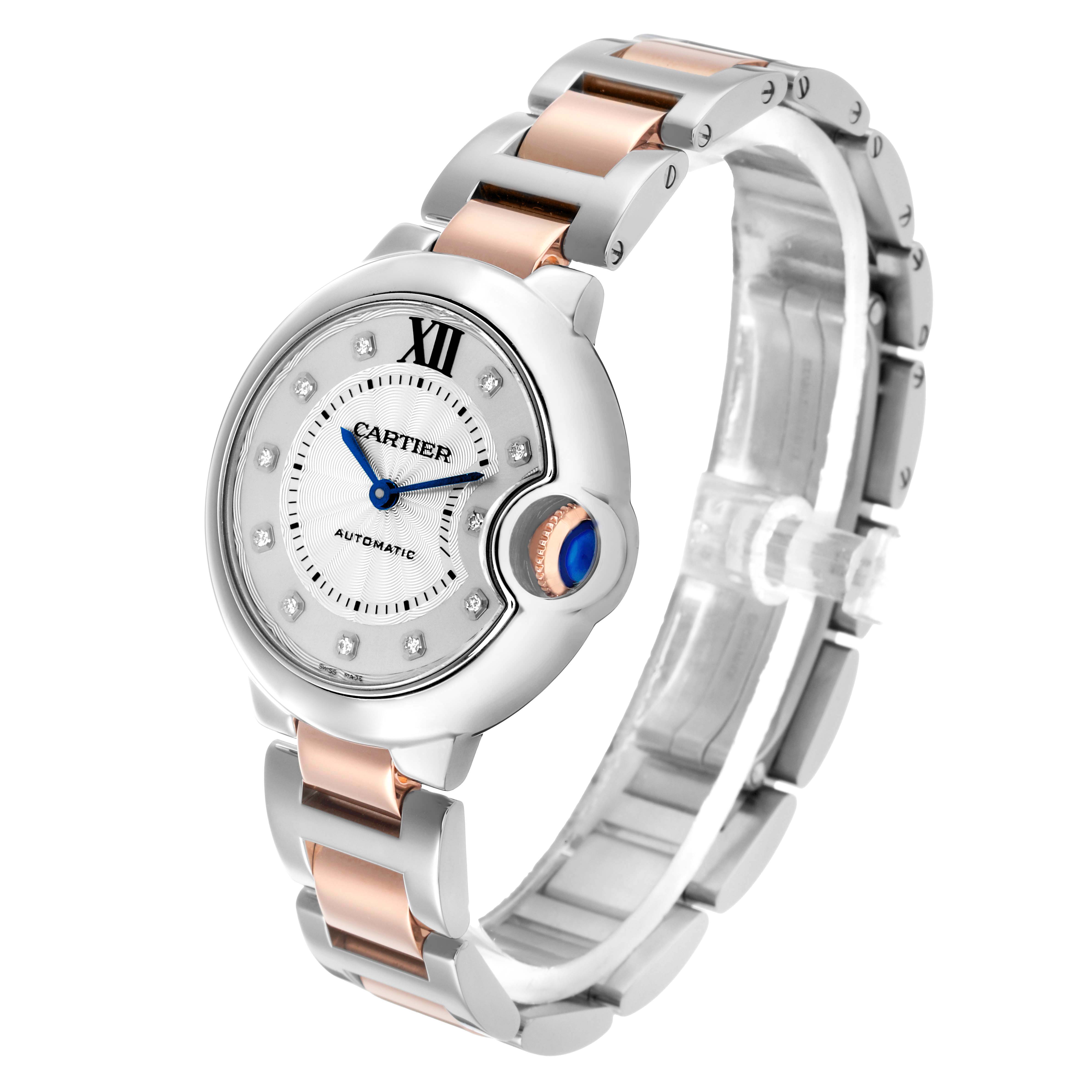 The Cartier Ballon Bleu WE902044 Women's Stainless Steel Silver Dial watch is shown at an angle highlighting its face, crown, and mixed metal bracelet.