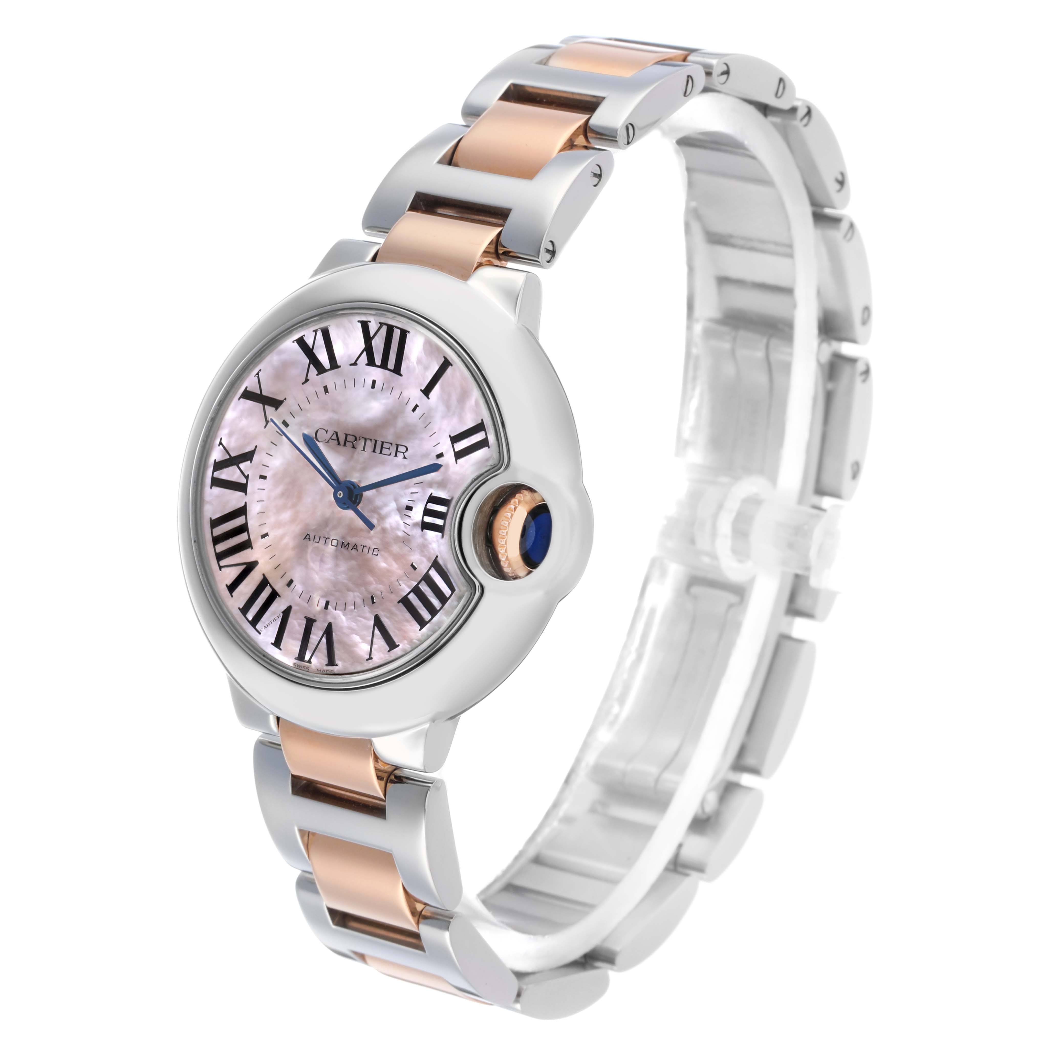 The Cartier Ballon Bleu W6920070 Women's Steel and Gold (two tone) Mother of Pearl Dial watch is shown at a slightly tilted angle, highlighting its dial, crown, and two-tone bracelet.