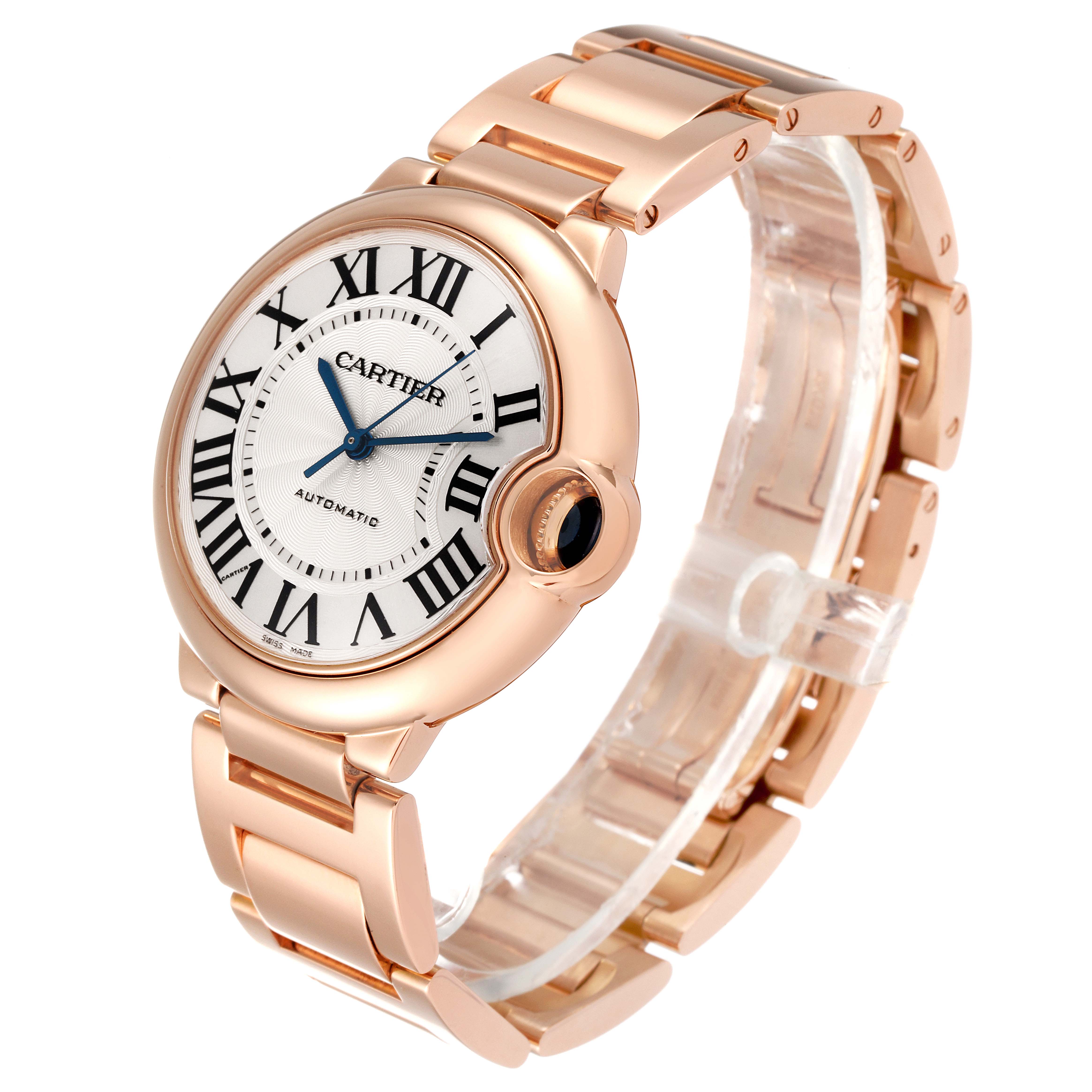 The Cartier Ballon Bleu W69004Z2 Men's Rose Gold Silver Dial W69004Z2 Men's Rose Gold Silver Dial watch is shown at a three-quarter angle, highlighting its face, bracelet, and unique crown.