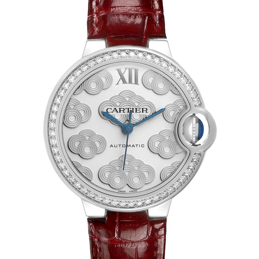 The Cartier Ballon Bleu W4BB0027 Women's Stainless Steel Silver Dial watch is shown from the front, displaying the face, bezel with diamonds, and a red leather strap.