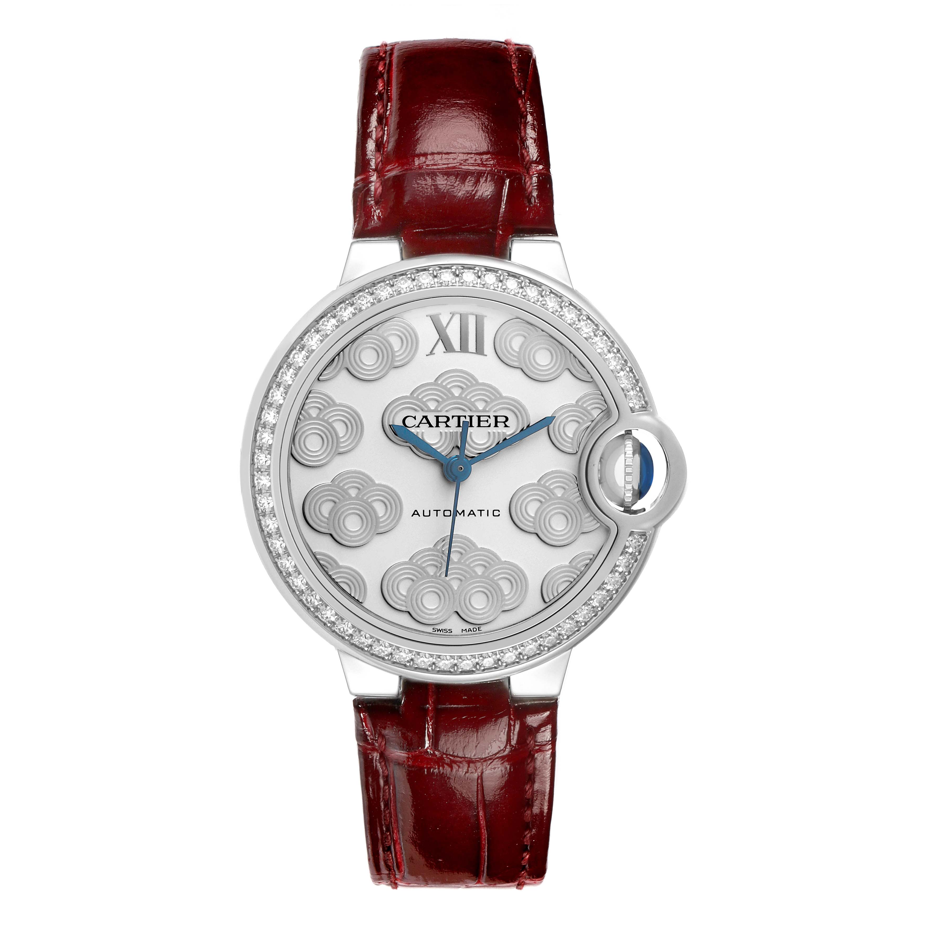 The Cartier Ballon Bleu W4BB0027 Women's Stainless Steel Silver Dial watch is shown from a front angle, highlighting its dial, hands, and red strap.