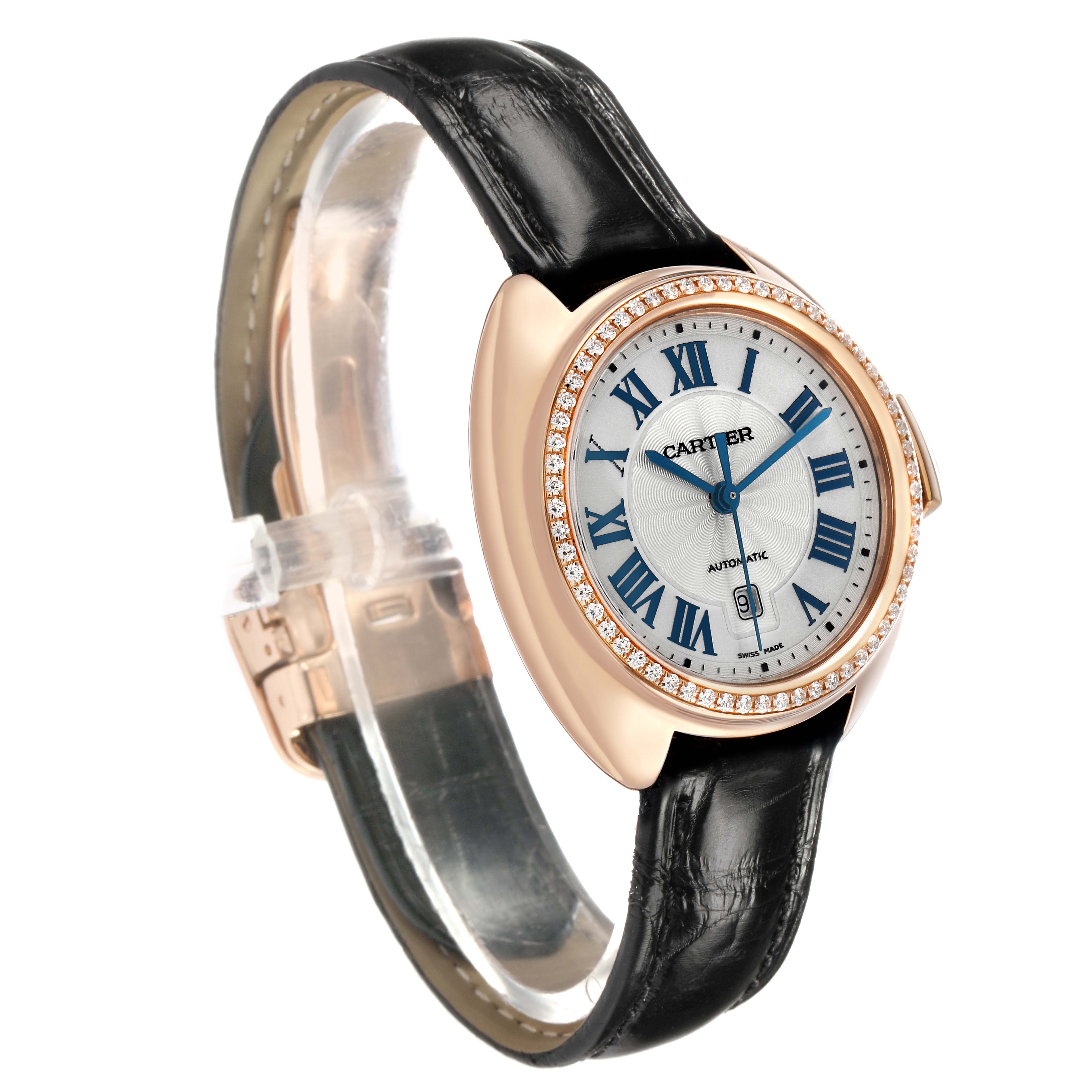 The Cartier Clé watch is shown at an angle displaying the face, bezel, and black leather strap.