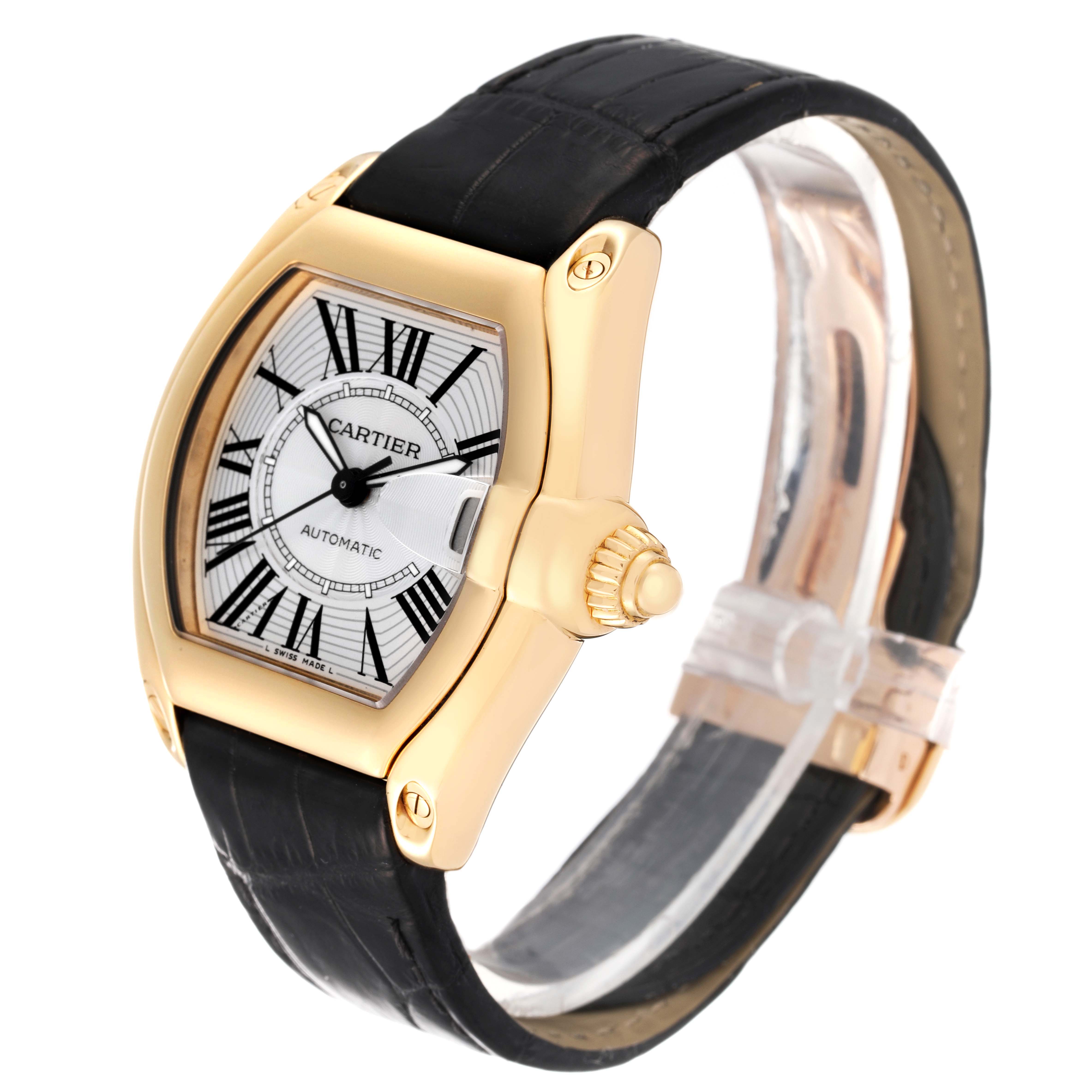 The image shows a Cartier Roadster W62005V2 Men's Yellow Gold Silver Dial W62005V2 Men's Yellow Gold Silver Dial watch at a front angle, highlighting the face, crown, and leather strap.