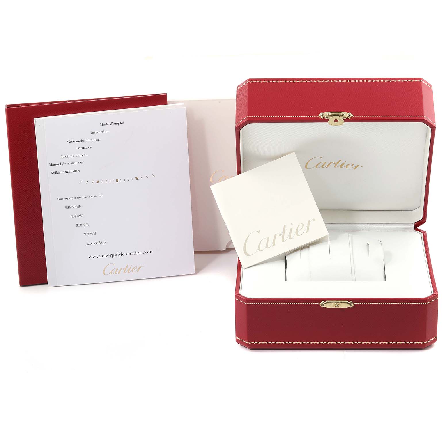 The image shows the packaging, manuals, and red leather box for a Santos model by Cartier.