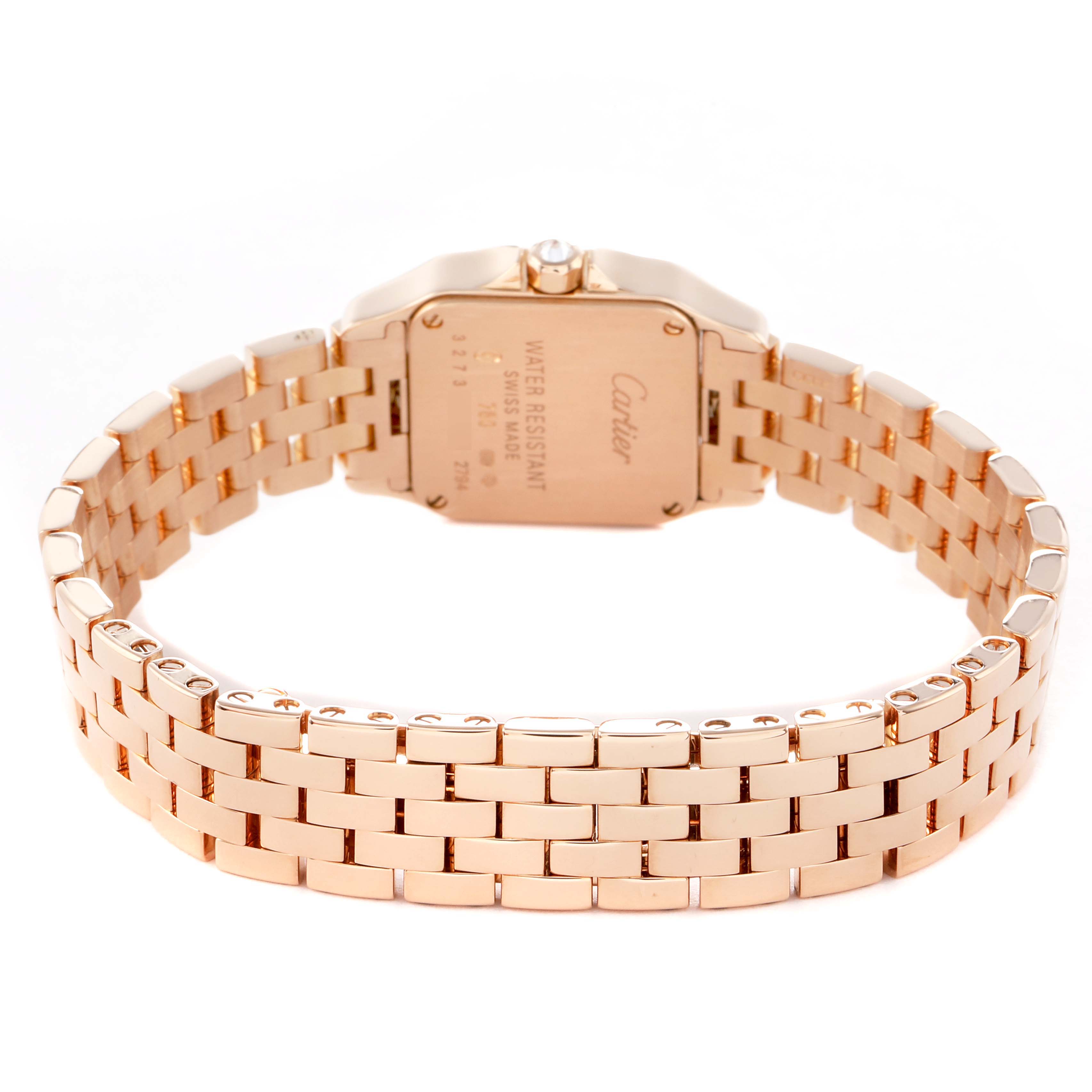 The image shows the back view of a Santos Demoiselle by Cartier, highlighting the case back and bracelet.