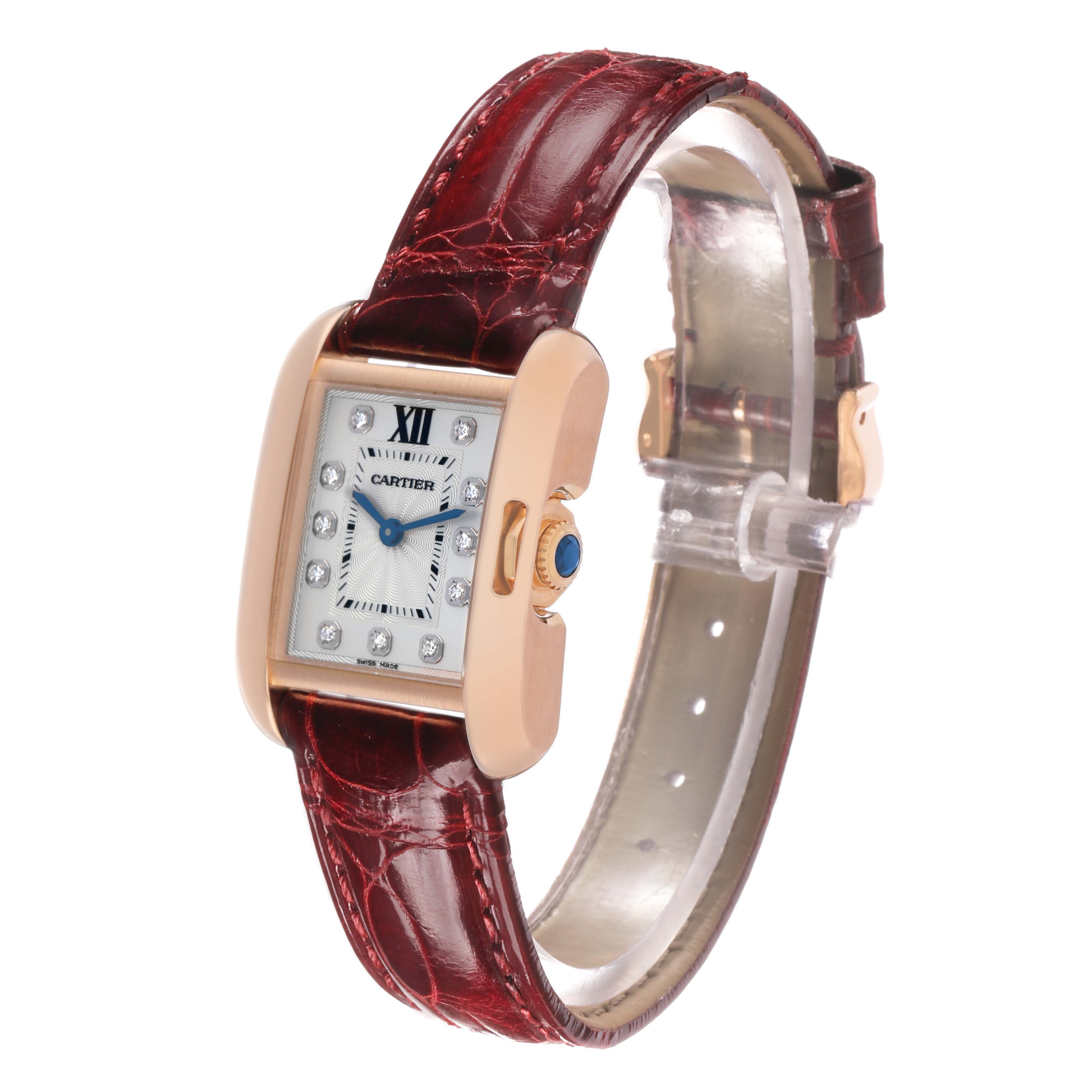The Cartier Tank Anglaise WJTA0007 Women's Rose Gold Silver Dial watch is shown at an angle highlighting the dial, crown, and leather strap.