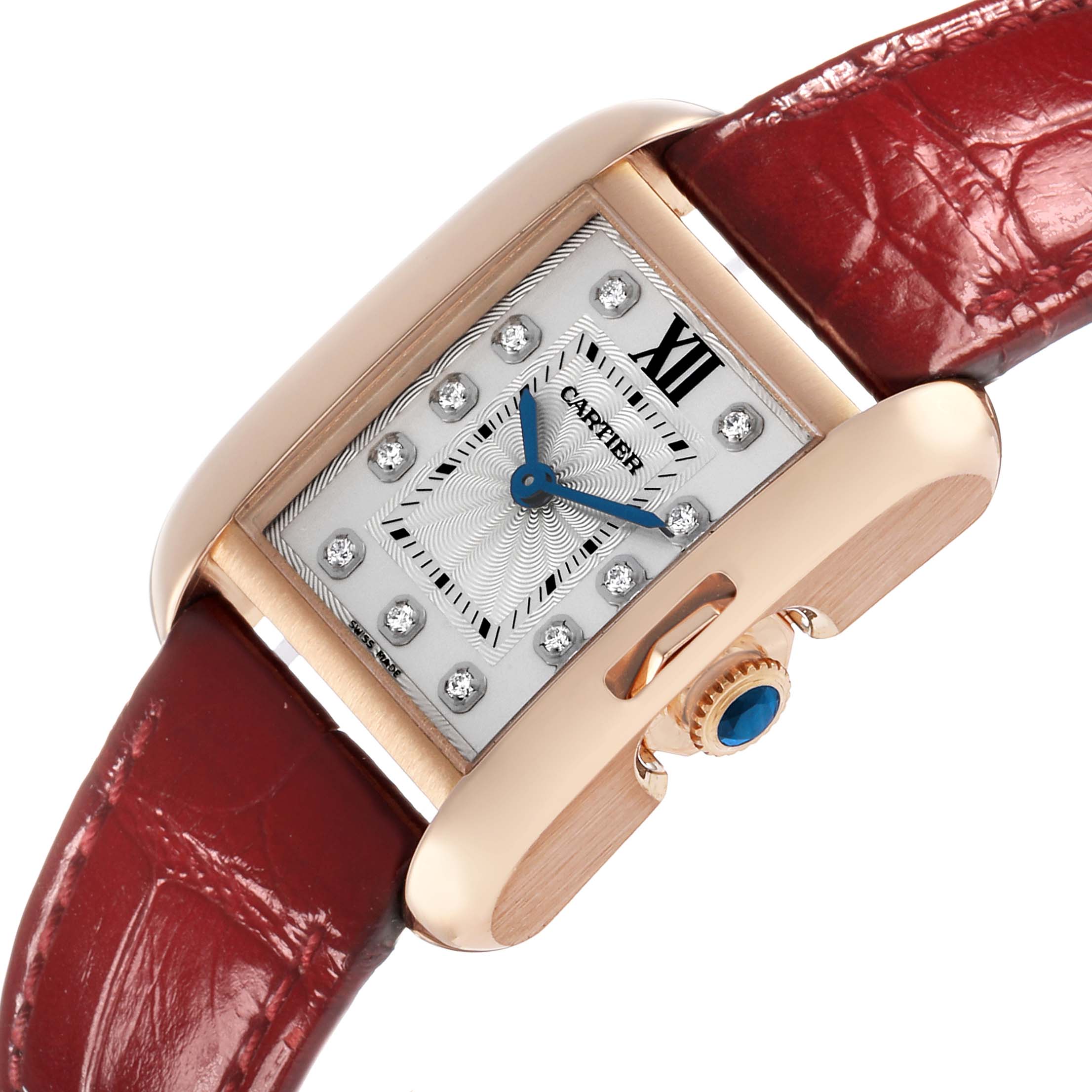 The Cartier Tank Anglaise WJTA0007 Women's Rose Gold Silver Dial watch is shown at an angled view, highlighting the dial, case, crown, and red leather strap.