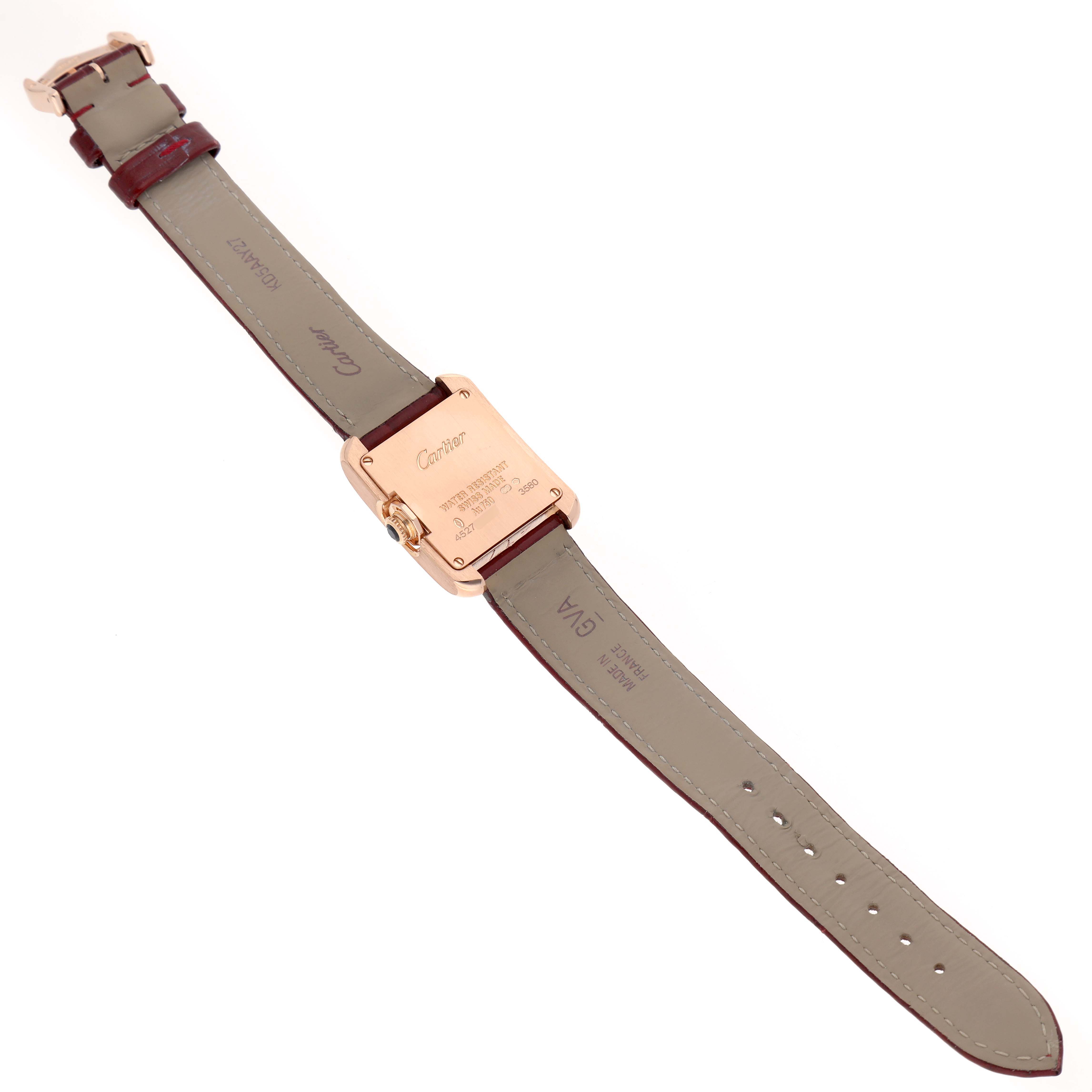 The Cartier Tank Anglaise WJTA0007 Women's Rose Gold Silver Dial watch is shown from the back, displaying the case back, strap, and buckle.