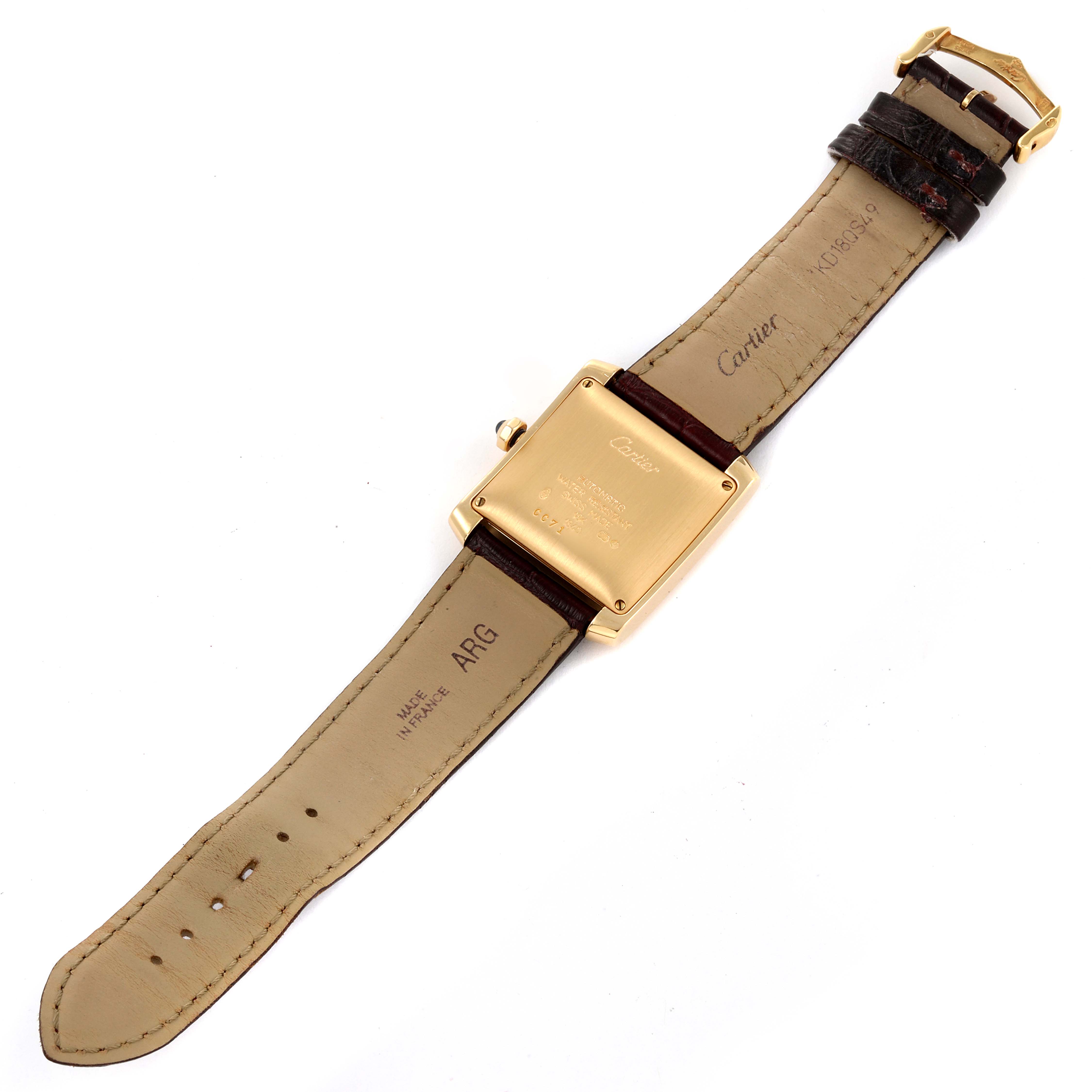 The image shows the back view of a Cartier Tank Francaise W5000156 Men's Yellow Gold Silver Dial W5000156 Men's Yellow Gold Silver Dial watch, displaying the strap, buckle, and case back.