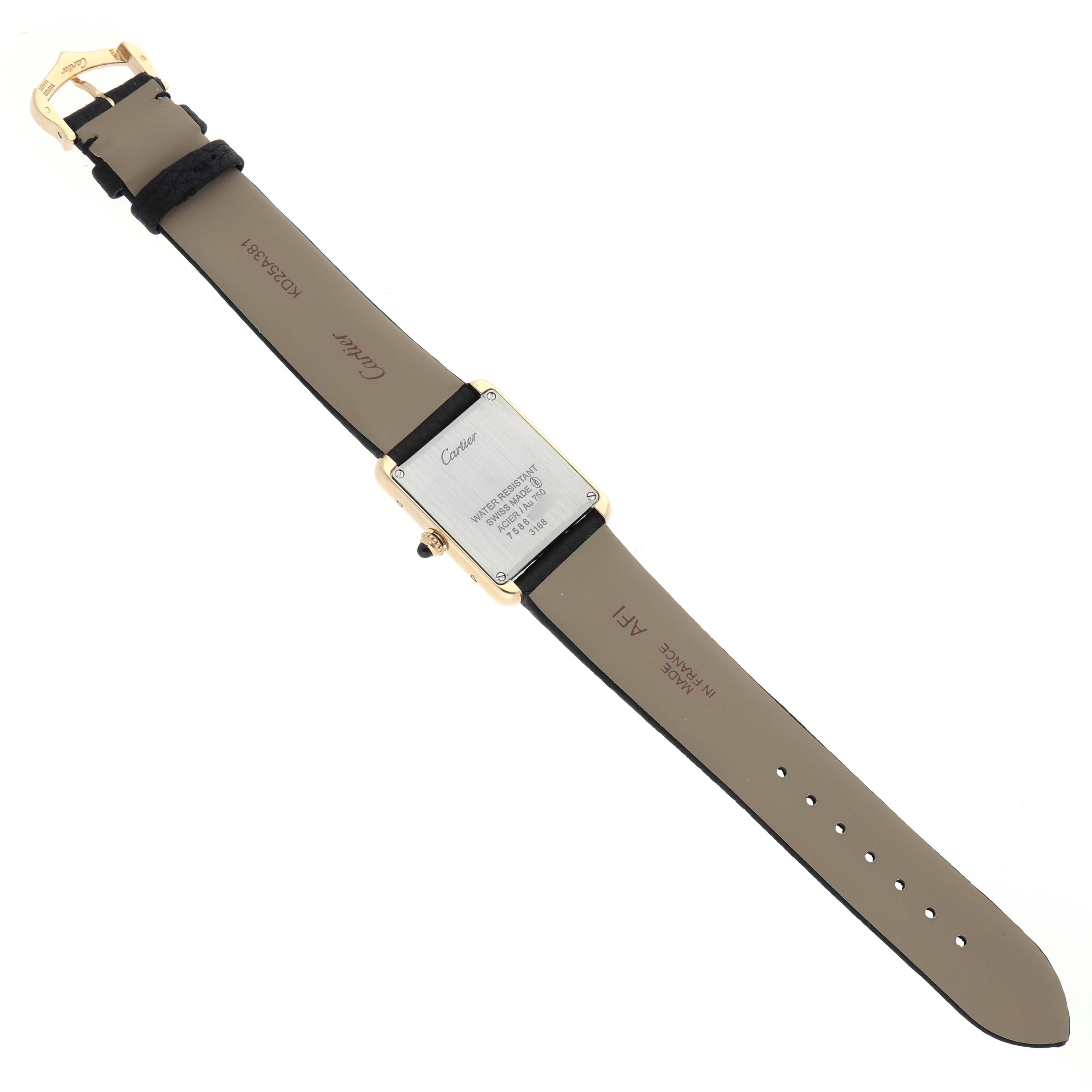 The Cartier Tank Solo W5200002 Women's Steel and Gold (two tone) Silver Dial watch is shown from the back, displaying the case back and leather strap.