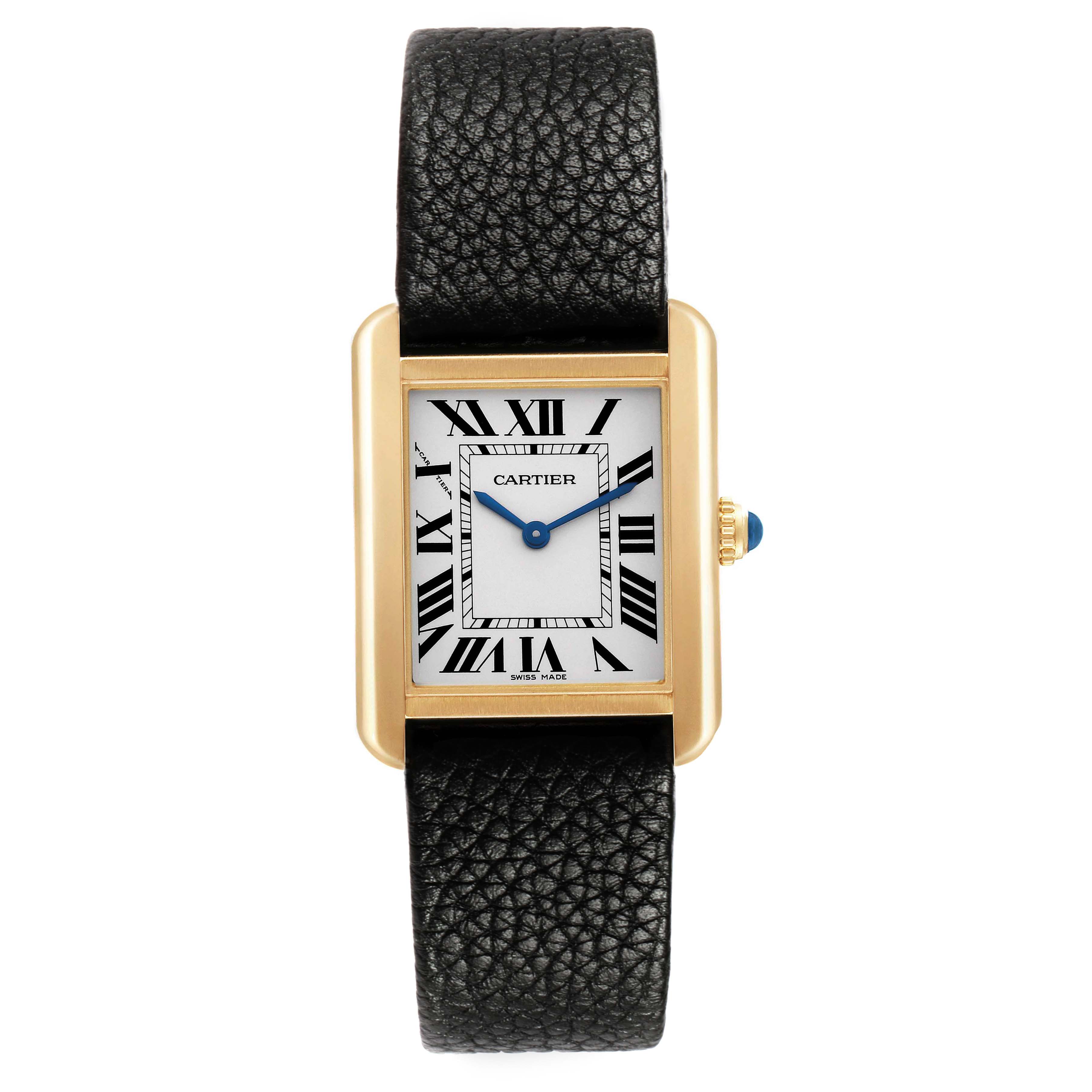 The Cartier Tank Solo W5200002 Women's Steel and Gold (two tone) Silver Dial watch is shown from a front angle, displaying its dial, rectangular case, leather strap, and crown with a blue cabochon.