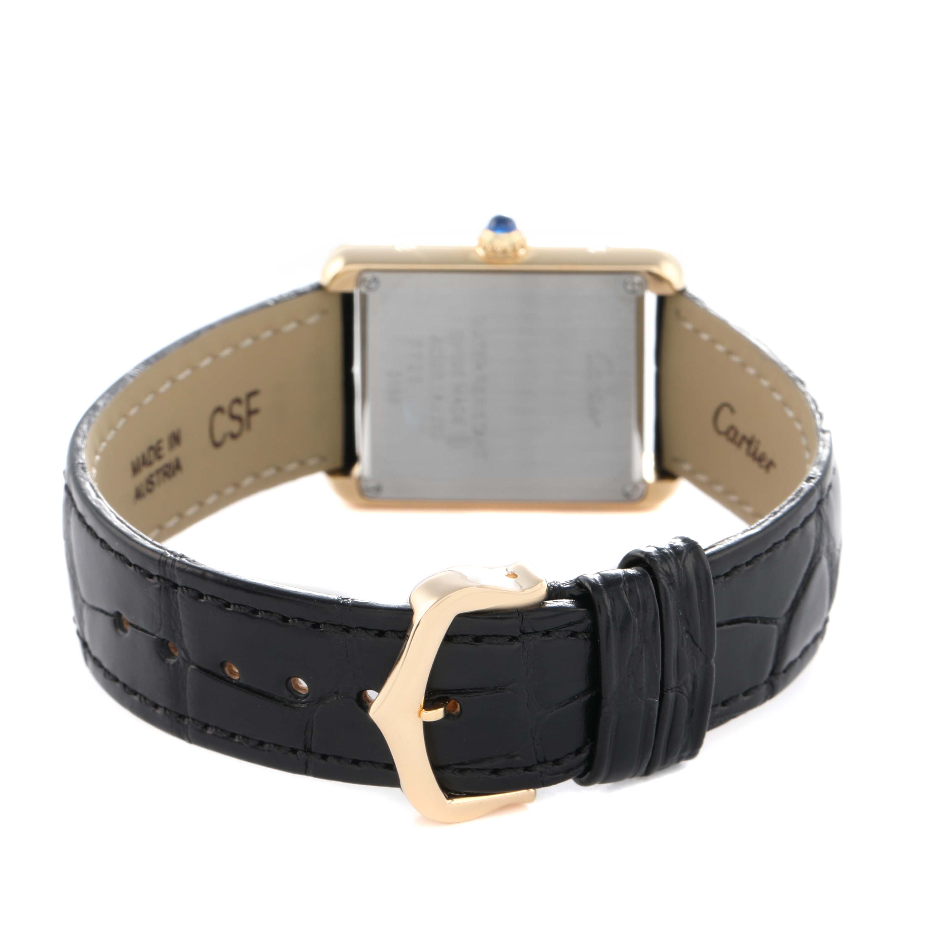 The image shows the back of a Cartier Tank Solo W5200002 Women's Yellow Gold Silver Dial watch, highlighting the case and leather strap with a clasp.