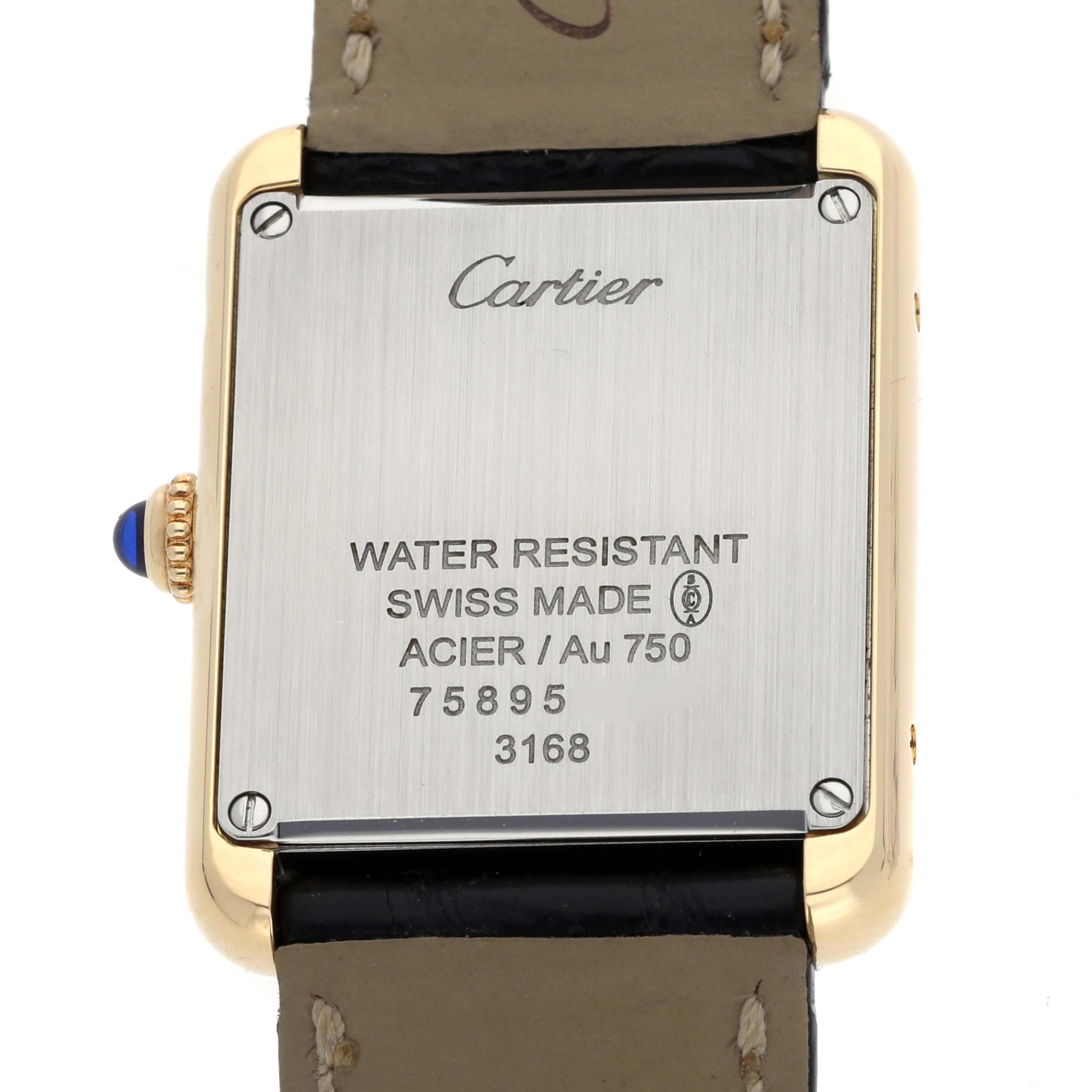 The image shows the back of a Cartier Tank Solo W5200002 Women's Steel and Gold (two tone) Silver Dial watch, highlighting the case details and features.