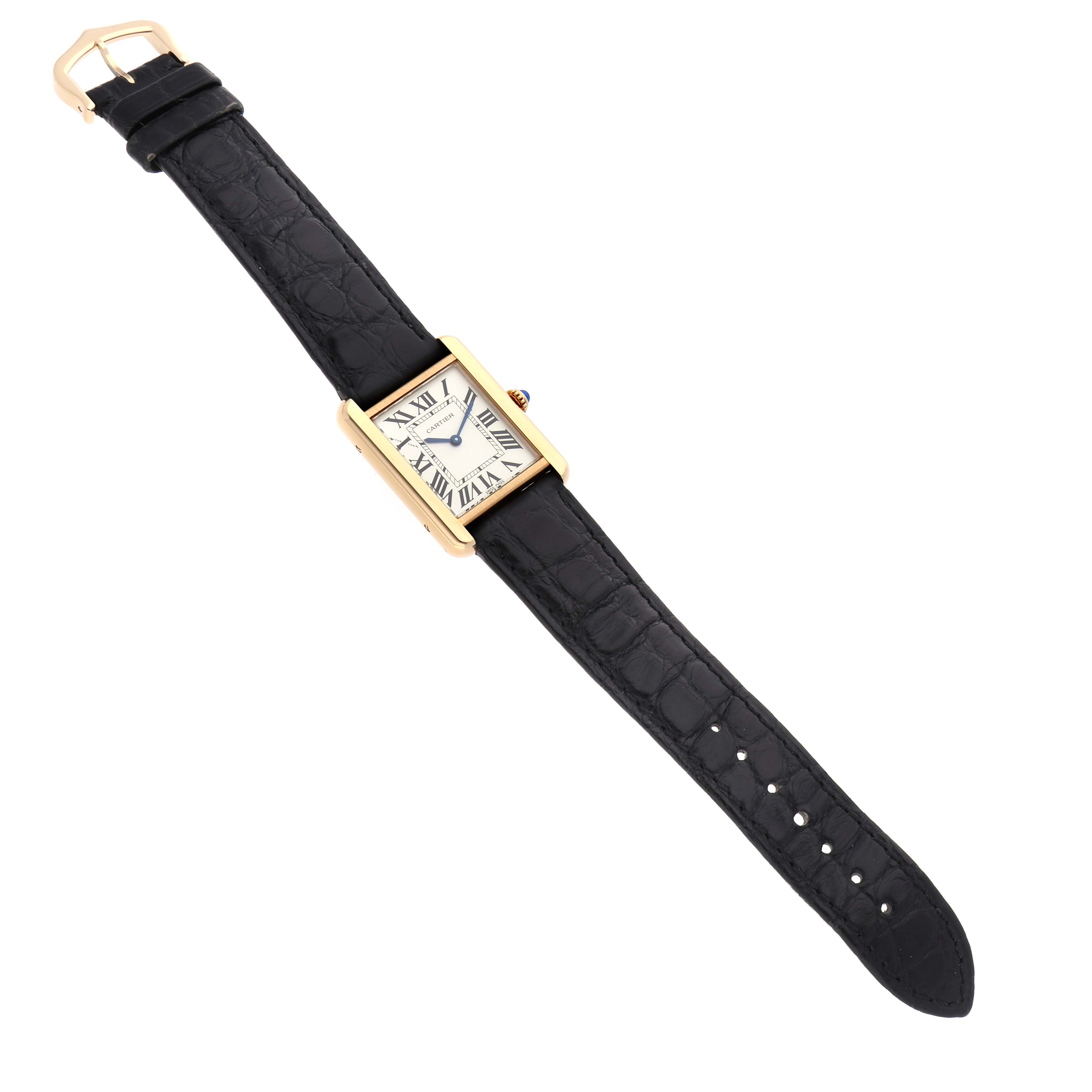 The Cartier Tank Solo W5200002 Women's Steel and Gold (two tone) Silver Dial watch is shown from a top-down angle, displaying the entire watch and strap.