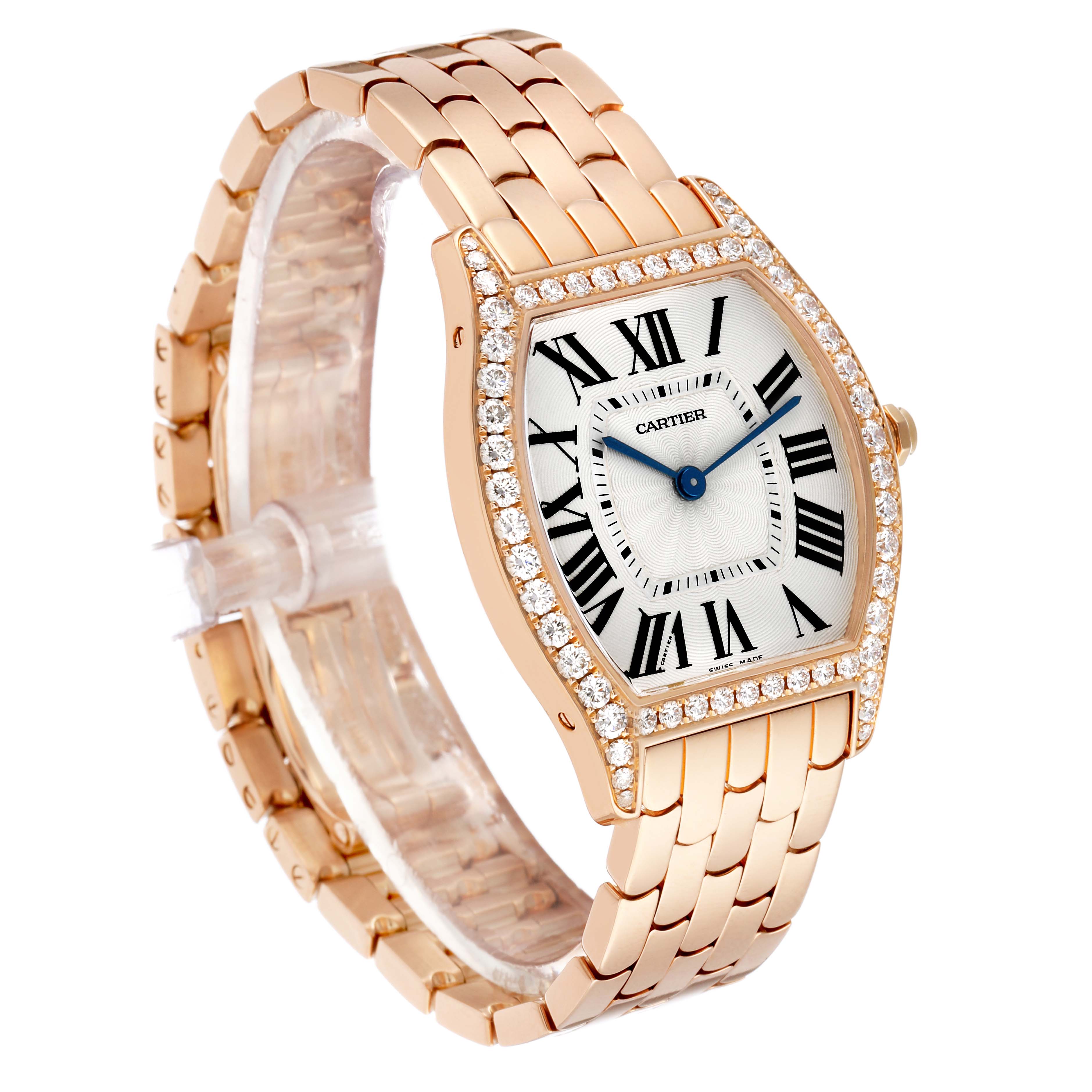 The Cartier Tortue WA501012 Women's Rose Gold Silver Dial watch is shown at a three-quarter angle, displaying the face, Roman numerals, and diamond-encrusted bezel.