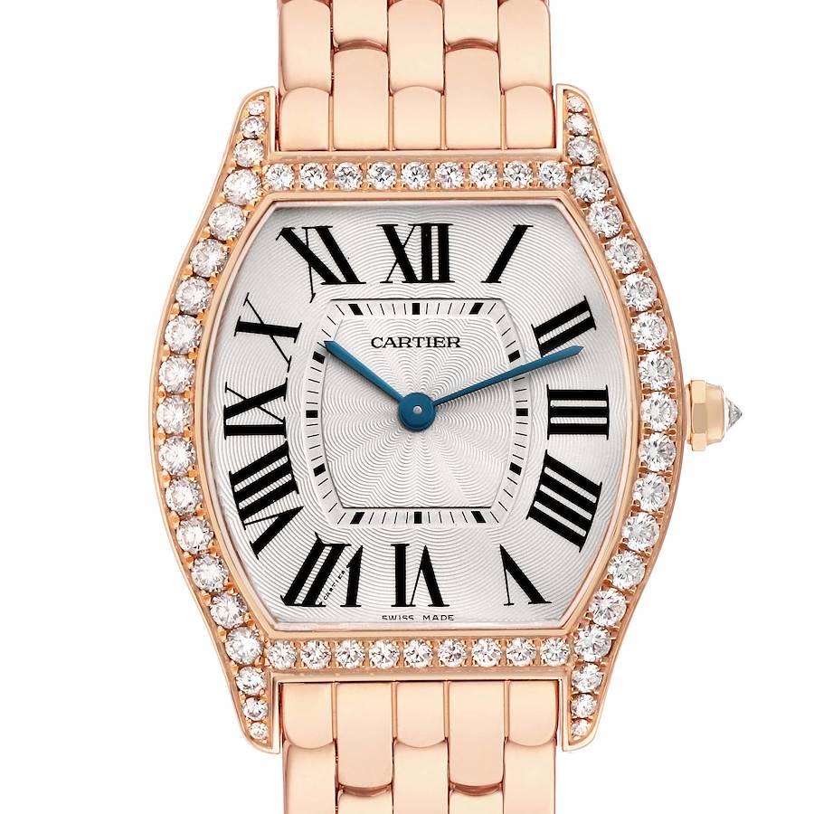 The Cartier Tortue WA501012 Women's Rose Gold Silver Dial watch is shown from the front, featuring a diamond-encrusted bezel, Roman numerals, and a metal bracelet.