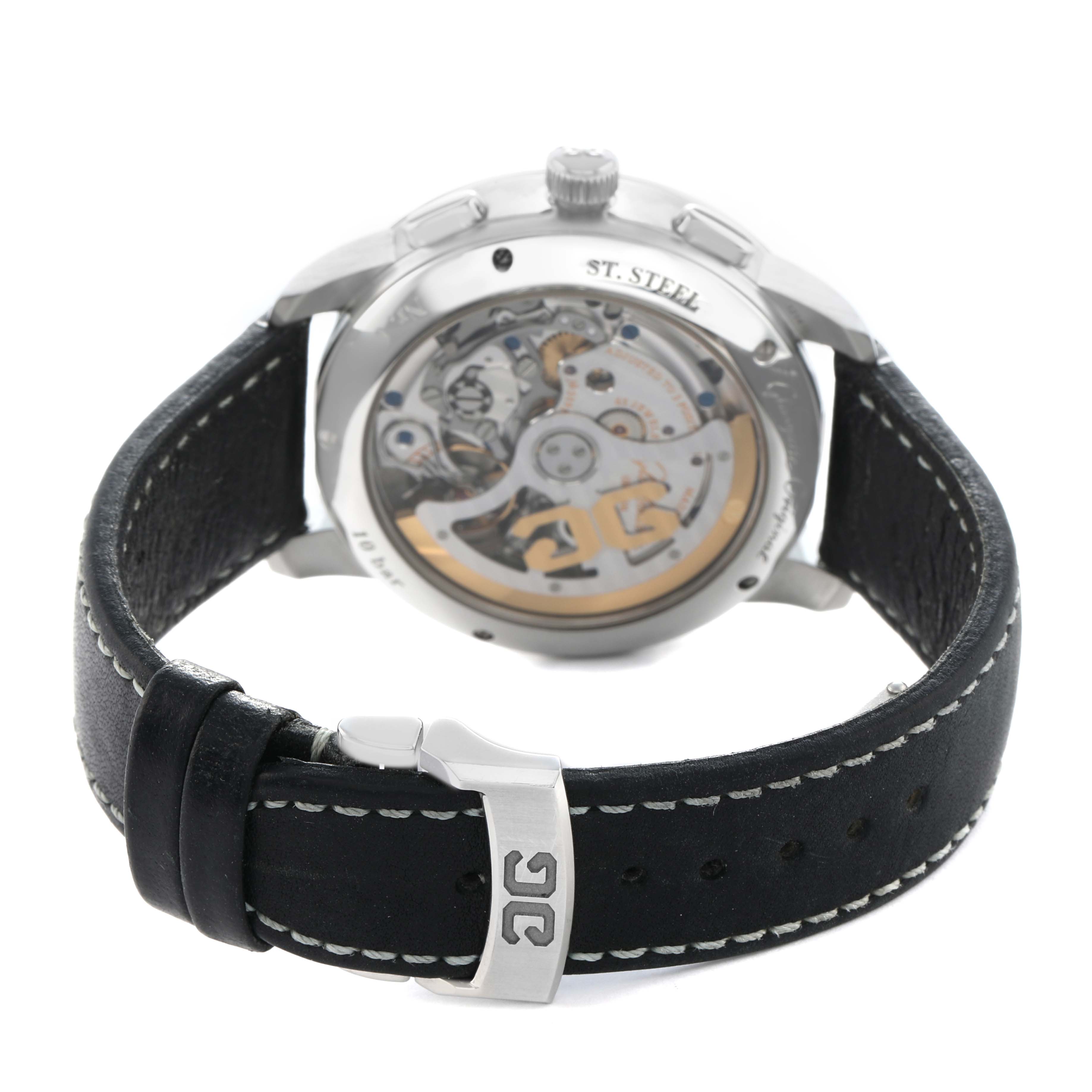 The image shows the back of the Glashütte Senator watch, highlighting its movement and leather strap with a metal buckle.