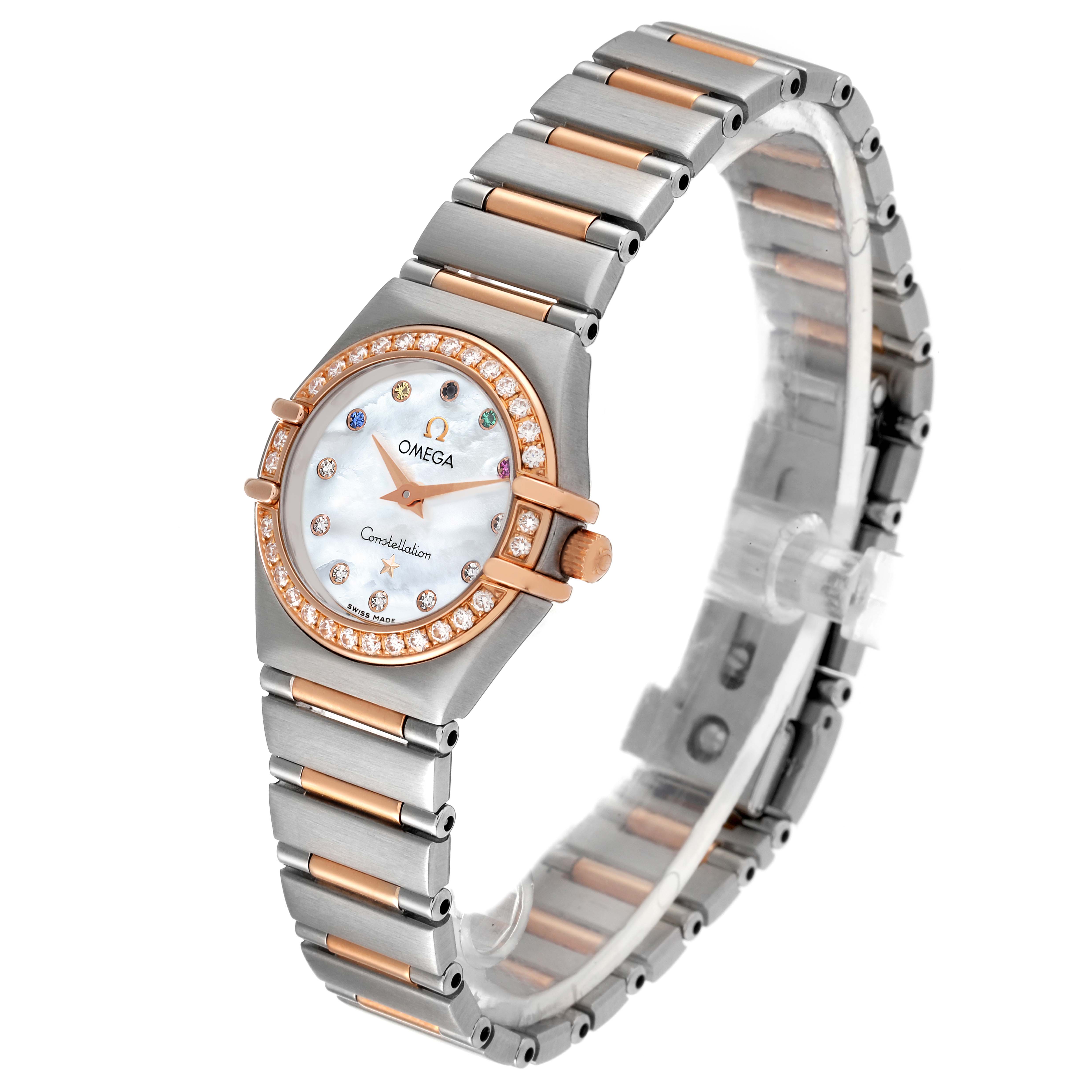 The watch is an Omega 111.25.23.60.55.002 Women's Steel and Gold (two tone) Mother of Pearl Dial 111.25.23.60.55.002 Women's Steel and Gold (two tone) Mother of Pearl Dial Constellation Olympic Steel Rose Gold Ladies Watch 11.25.23.60.55.002, shown at a side angle displaying the face and band.