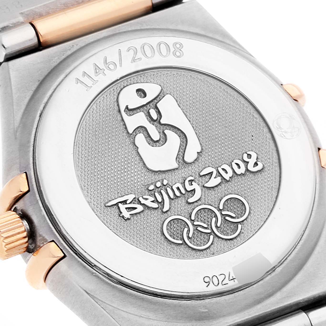 The image shows the back case of the Omega 111.25.23.60.55.002 Women's Steel and Gold (two tone) Mother of Pearl Dial 111.25.23.60.55.002 Women's Steel and Gold (two tone) Mother of Pearl Dial Constellation Olympic Steel Rose Gold Ladies Watch model 11.25.23.60.55.002 featuring Beijing 2008 engraving.