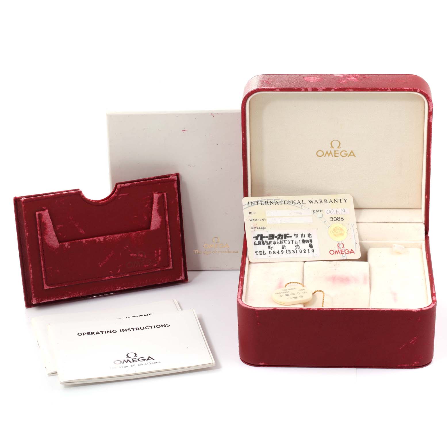 The image shows the Omega Seamaster 2561.80.00 Men's Stainless Steel Blue Dial 2561.80.00 Men's Stainless Steel Blue Dial watch's box, international warranty card, operating instructions, and accompanying accessories.