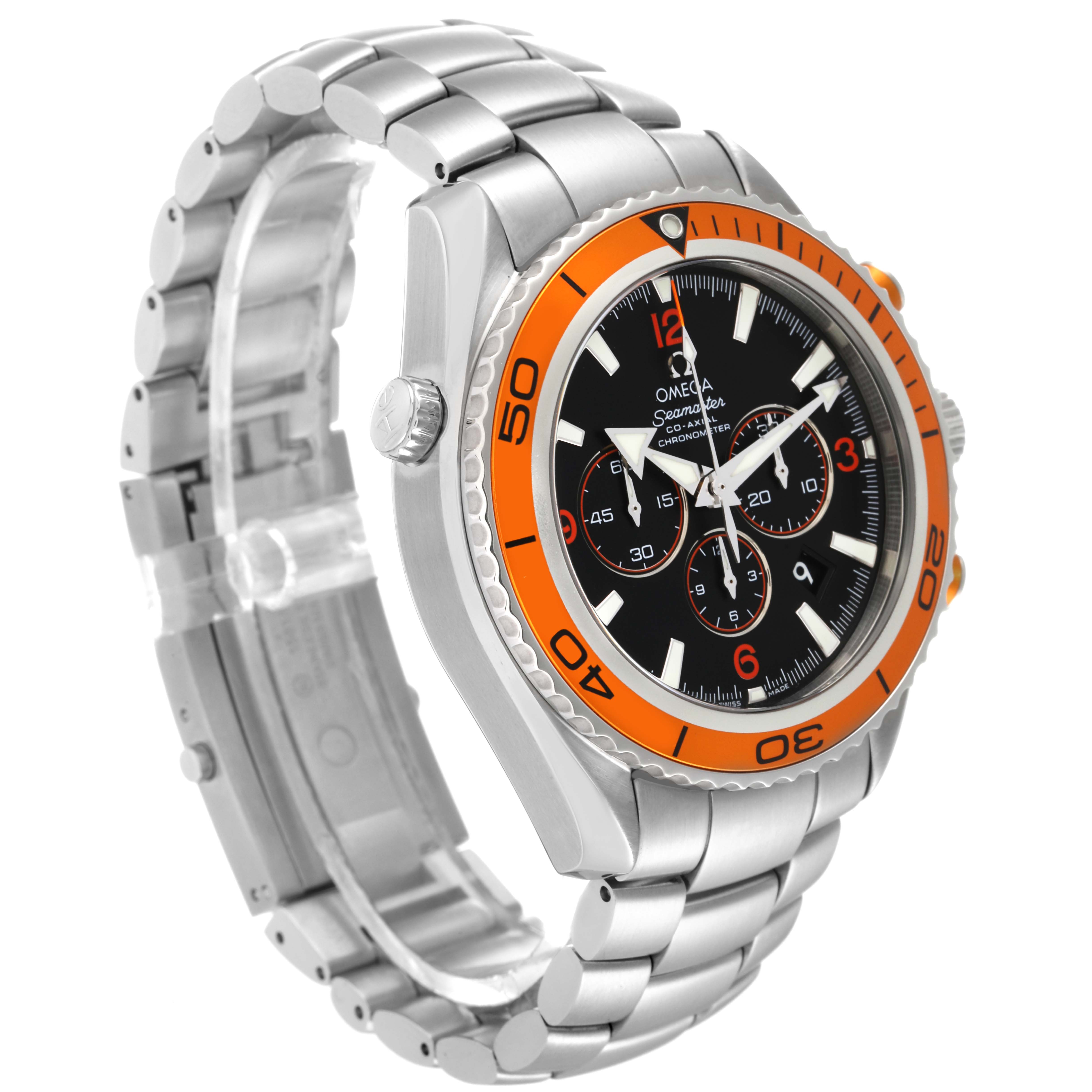 The image shows an angled view of the Omega Planet Ocean 2218.50.00 Men
s Stainless Steel Black Dial 2218.50.00 Men
s Stainless Steel Black Dial watch, highlighting its stainless steel bracelet and black dial with an orange bezel.