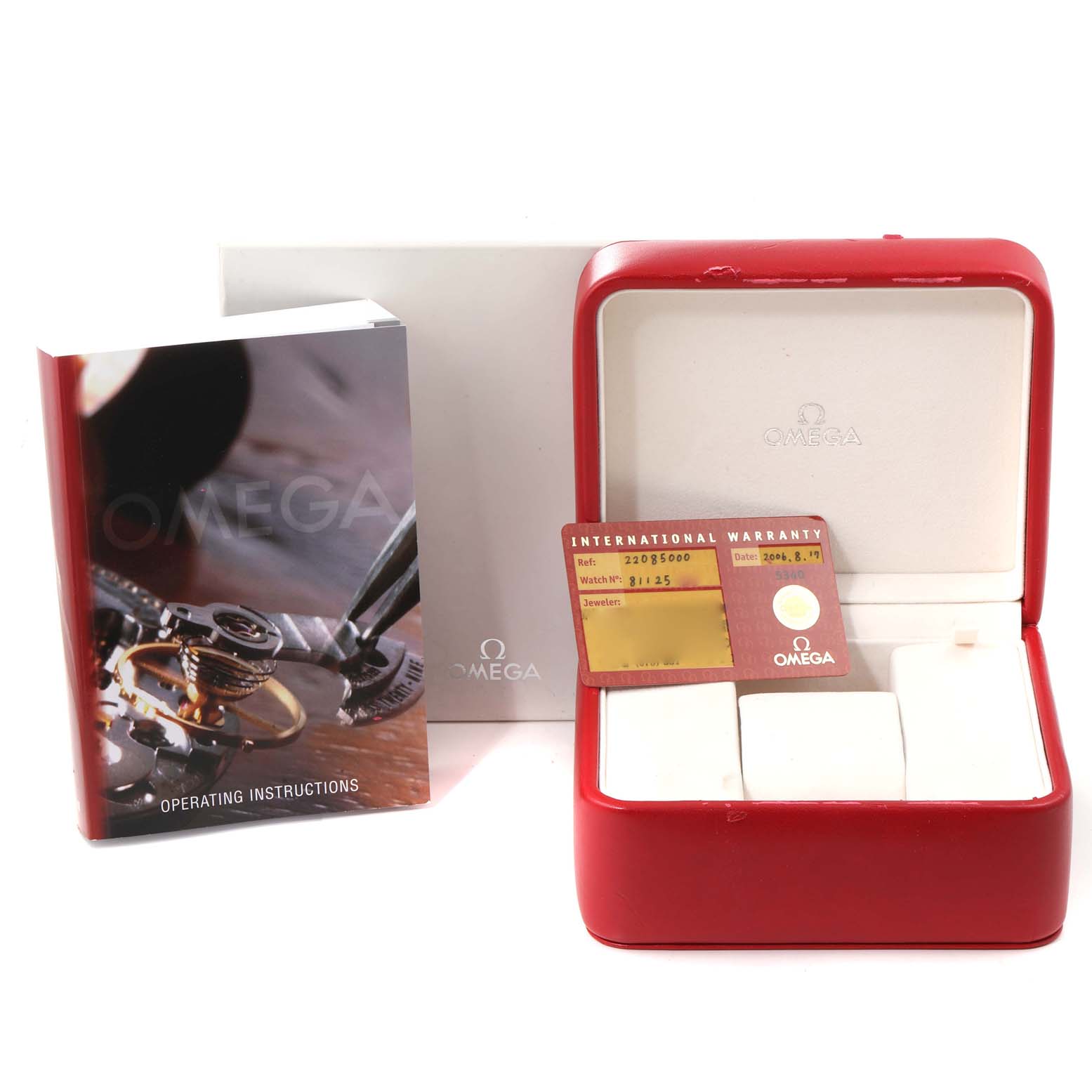 The image shows the Omega Planet Ocean 2208.50.00 Men's Stainless Steel Black Dial 2208.50.00 Men's Stainless Steel Black Dial's packaging, including the watch box, international warranty card, and operating instructions.