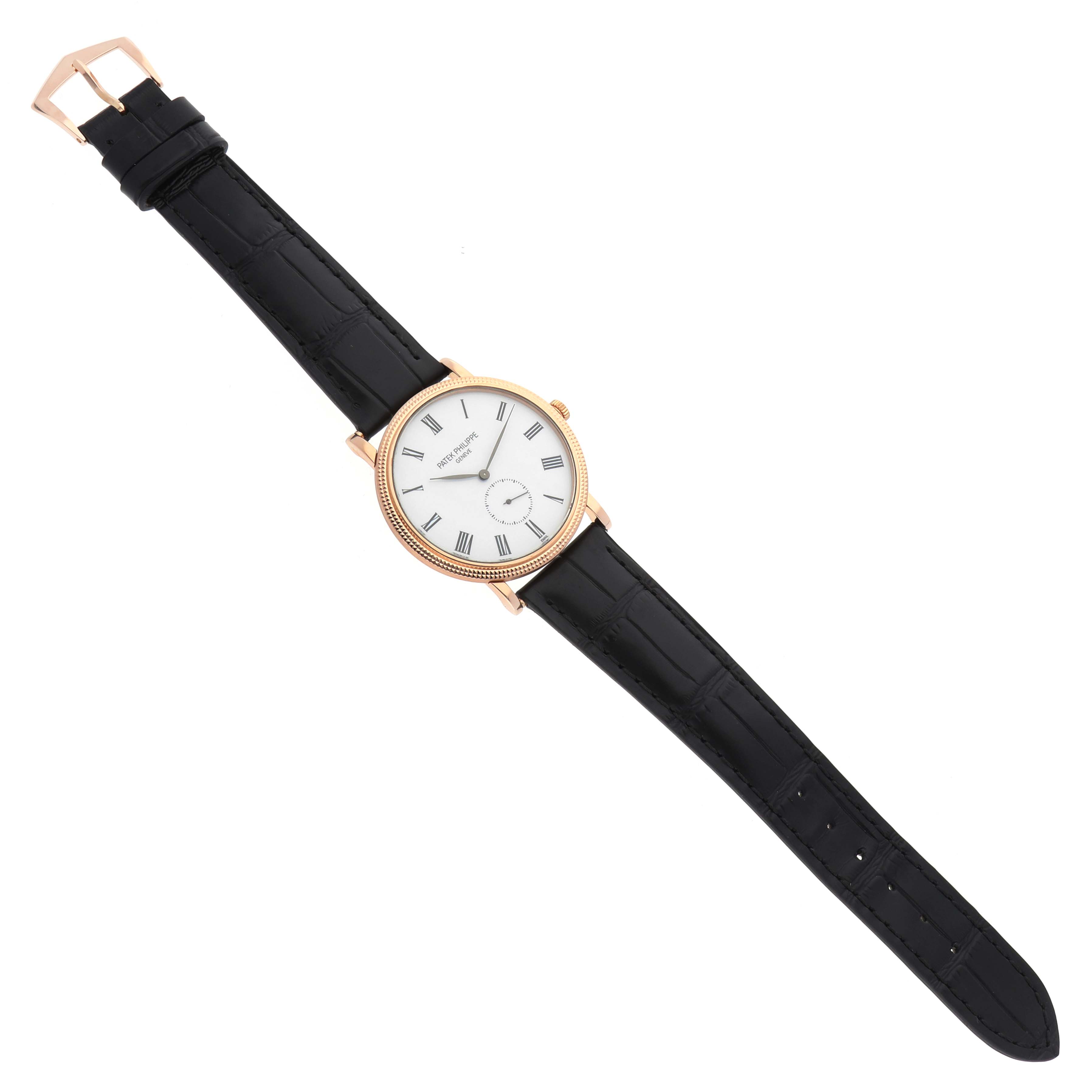 The Patek Philippe Calatrava 5116R Men's Rose Gold White Dial watch is shown from a top-down angle, displaying its round face, buckle, and full leather strap.