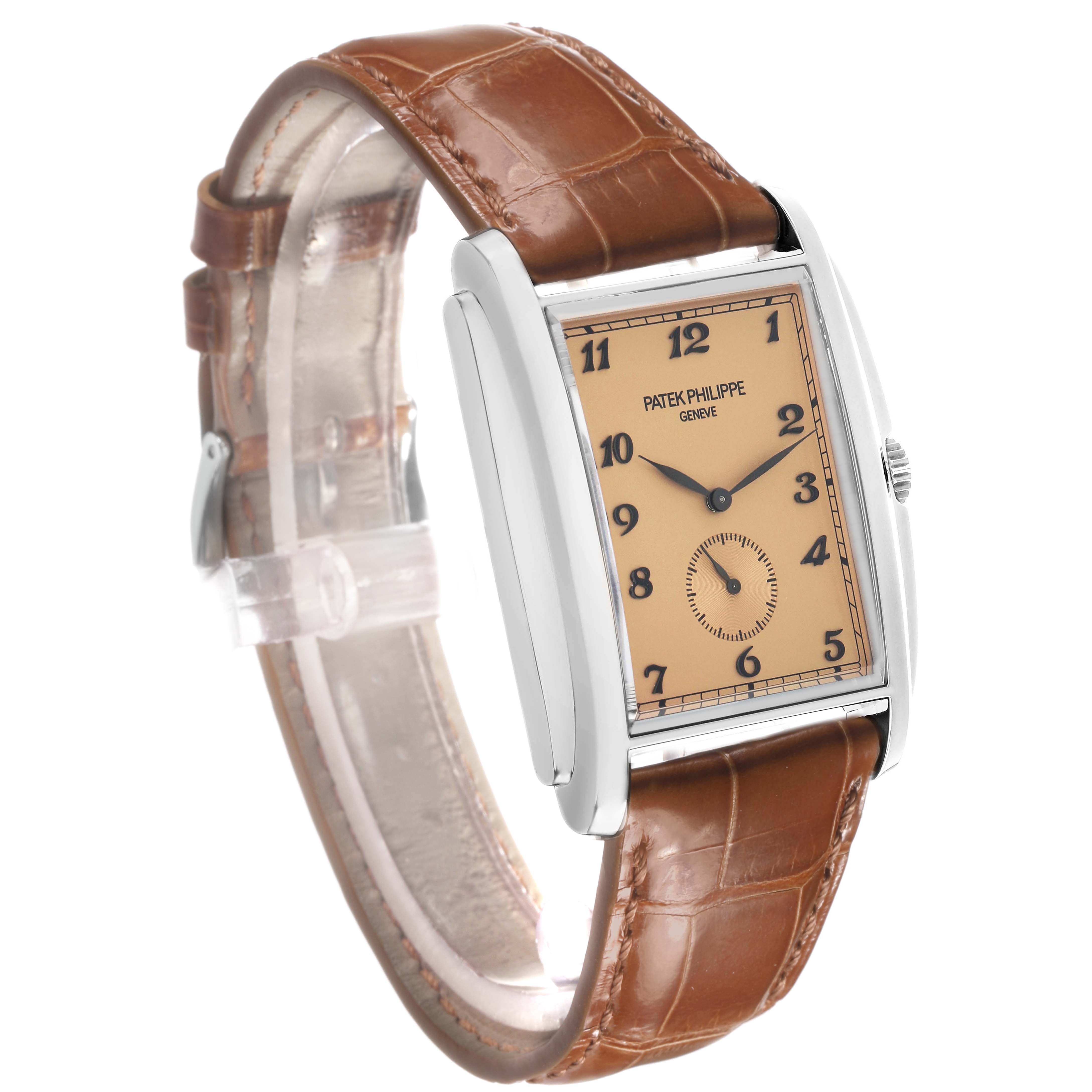 The Patek Philippe Gondolo 5124G Men's White Gold Brown Dial watch is shown at a three-quarter angle, highlighting its rectangular case and brown leather strap.