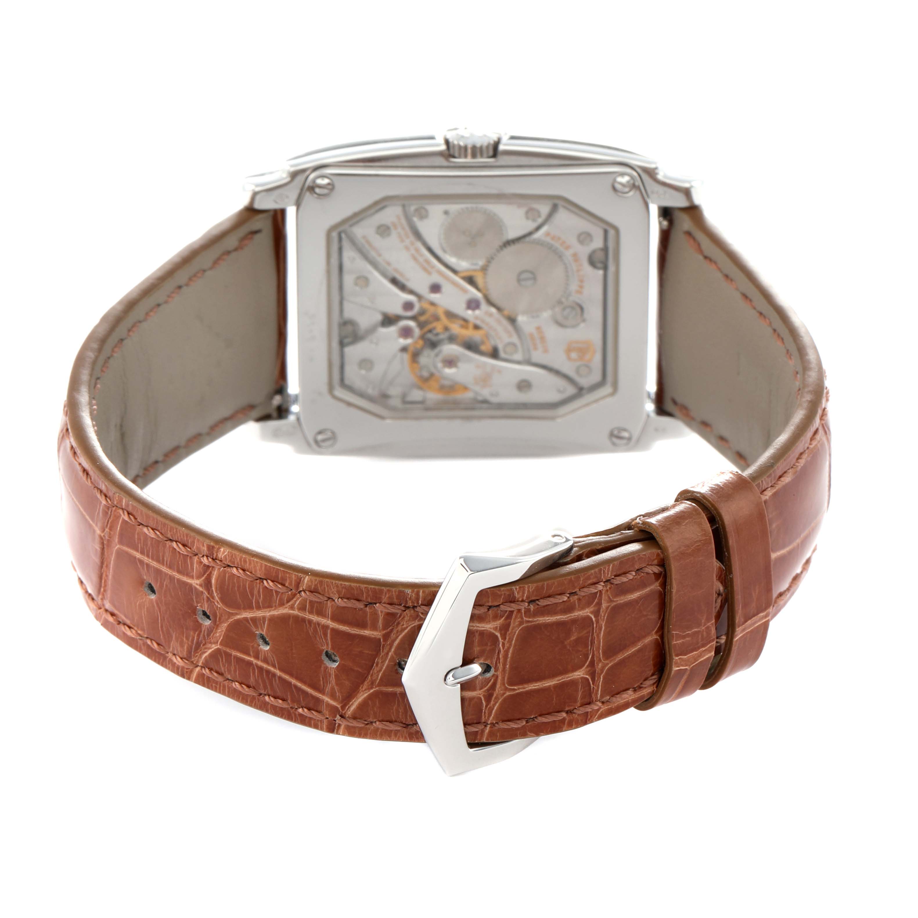 The image shows the back view of a Patek Philippe Gondolo 5124G Men's White Gold Brown Dial watch, highlighting its movement and brown leather strap with buckle.