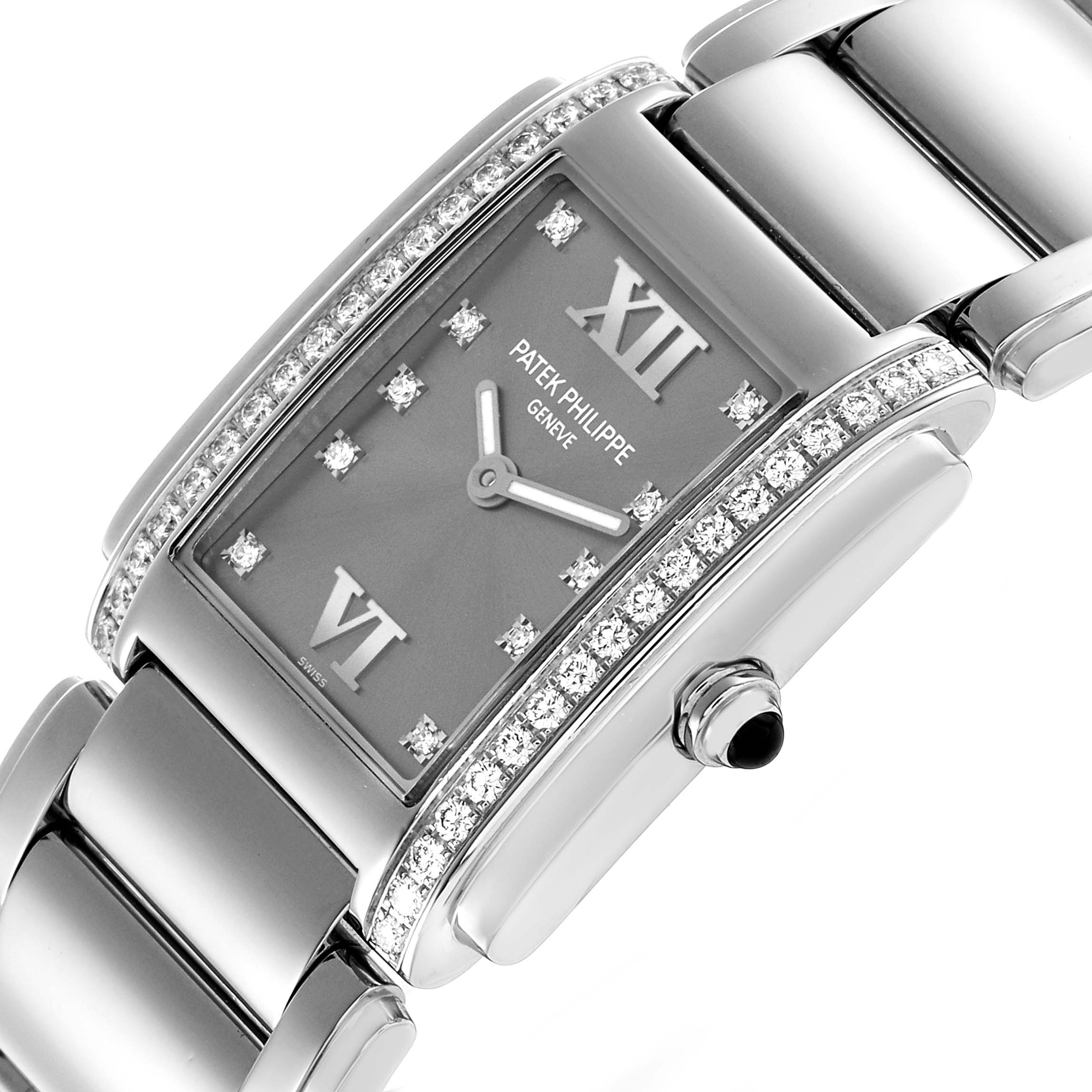 The Patek Philippe Twenty-4 4910A Women's Stainless Steel Silver Dial watch is shown at an oblique angle, highlighting the face, diamond-set bezel, and crown.