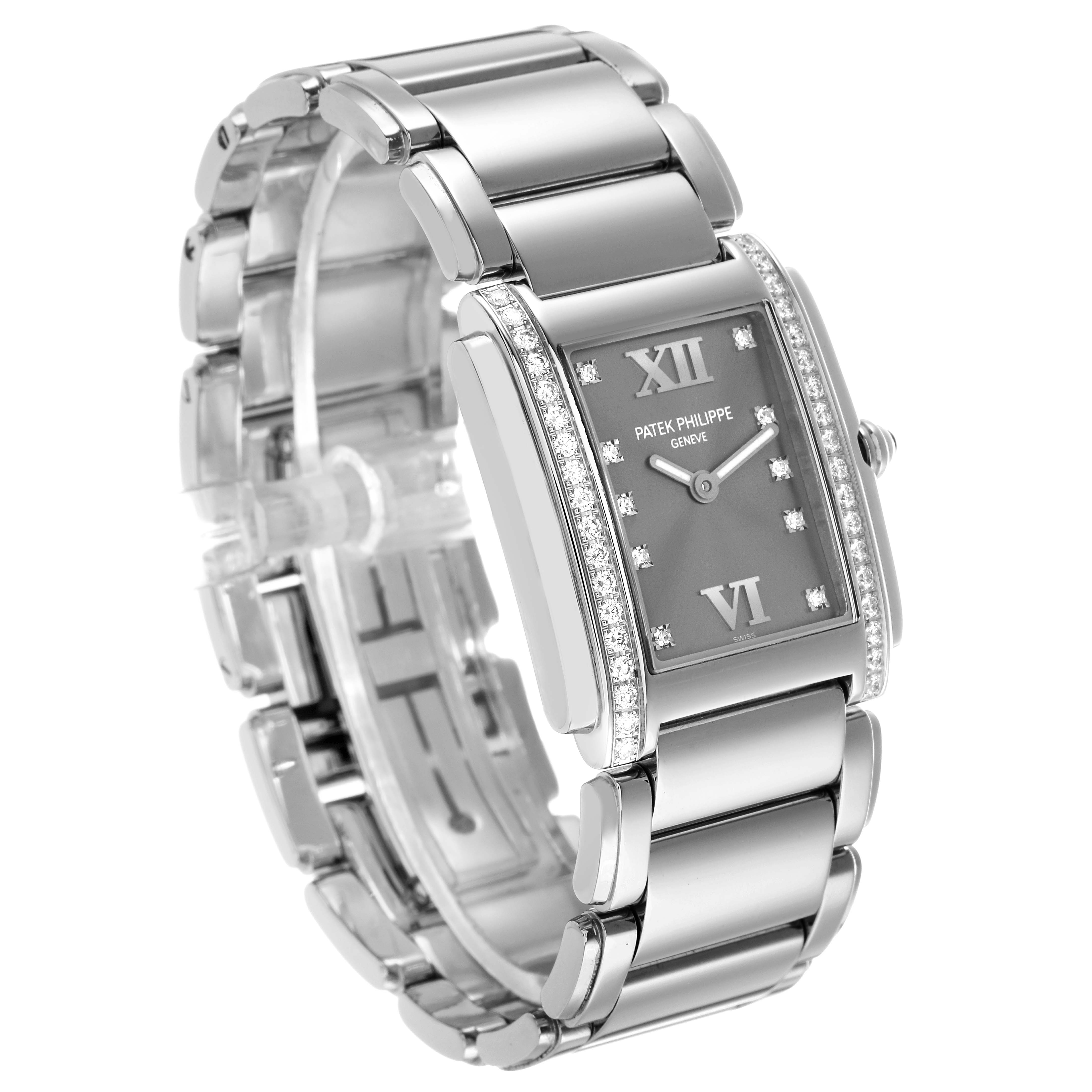 The Patek Philippe Twenty-4 4910A Women's Stainless Steel Silver Dial watch is shown at an angle displaying the bracelet, case, and diamond-encrusted bezel.