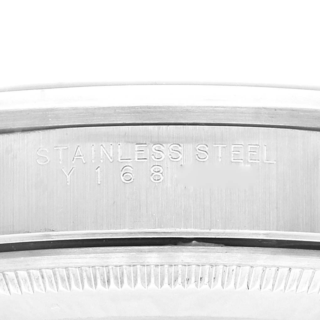 This image shows a close-up of the stainless steel casing and serial number engraving of a Rolex Air-King 14000 Men's Stainless Steel Blue Dial 14000 Men's Stainless Steel Blue Dial watch.