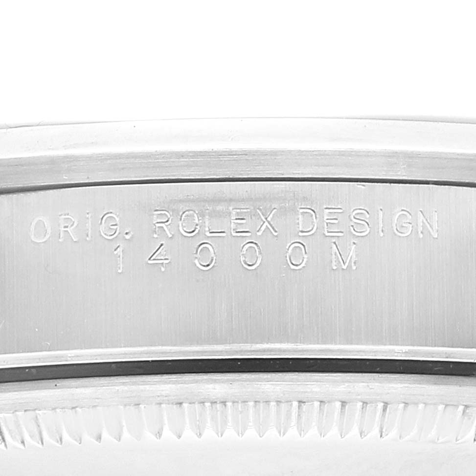 The image shows a close-up of the side of the Rolex Air-King 14000 Men's Stainless Steel Blue Dial 14000 Men's Stainless Steel Blue Dial watch case, displaying the model number 14000M and the engraving "ORIG. ROLEX DESIGN".