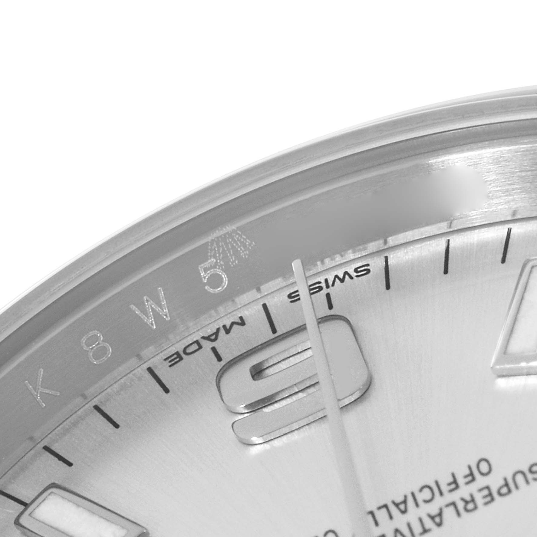 This image shows a close-up of the dial, specifically an area with the "Swiss Made" text and 5-minute marker of the Rolex Air-King 114200 Men's Stainless Steel Silver Dial 114200 Men's Stainless Steel Silver Dial watch.