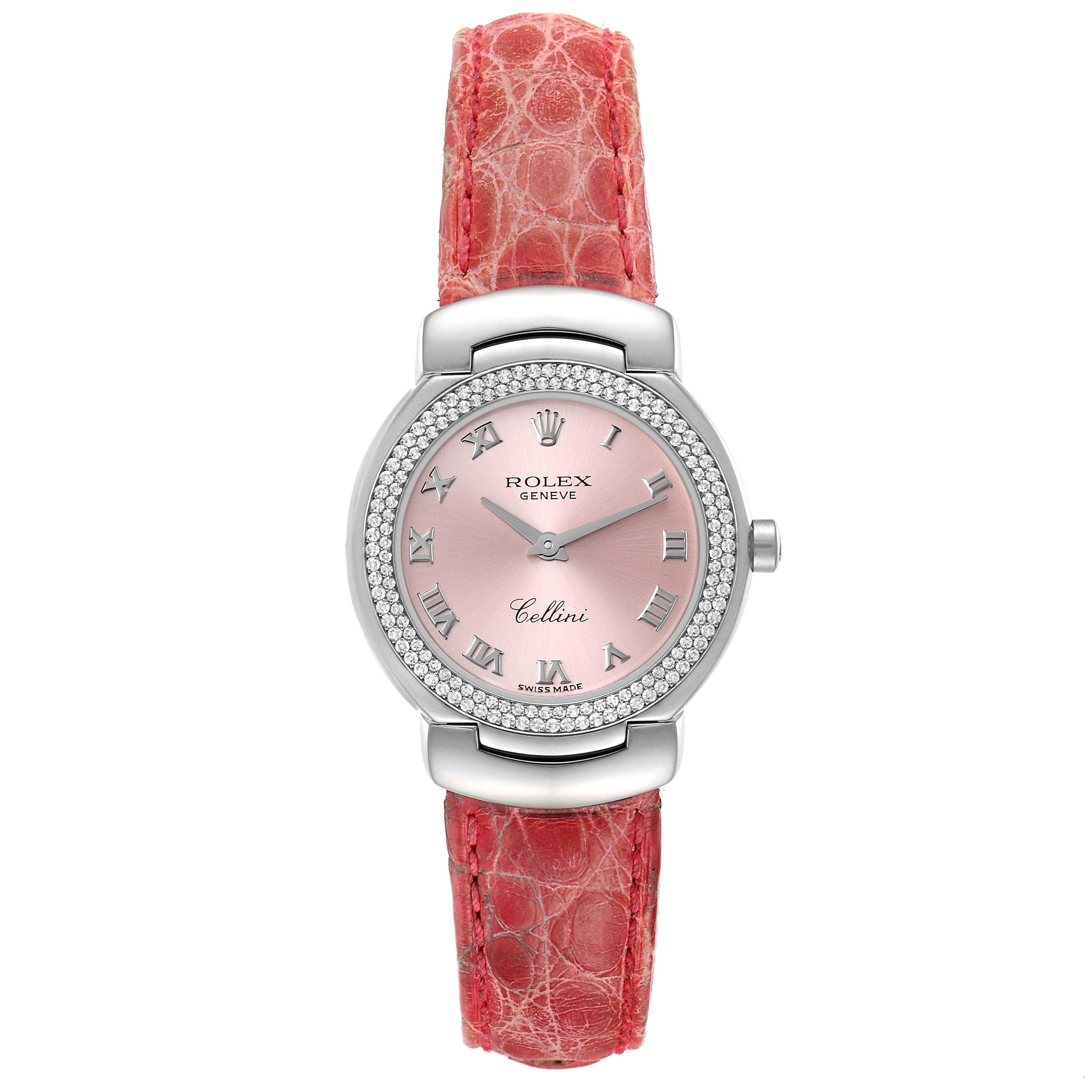 The Rolex Cellini 6671 Women's White Gold Pink Dial 6671 Women's White Gold Pink Dial watch is shown in a front view, displaying the dial, bezel, case, and red leather strap.