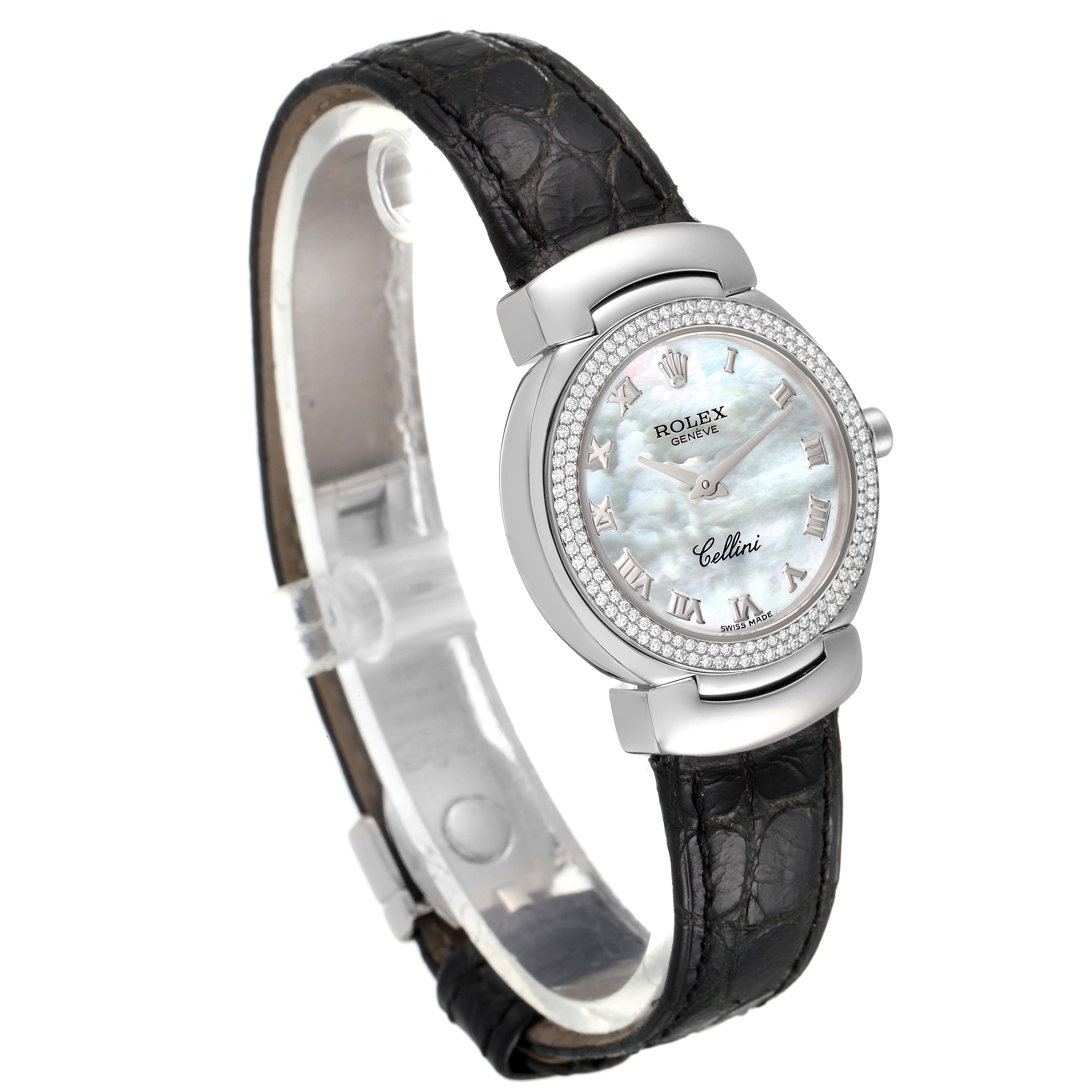 The Rolex Cellini 6671 Women's White Gold Mother of Pearl Dial 6671 Women's White Gold Mother of Pearl Dial watch is shown from an angled perspective, displaying the face, bezel, and black leather strap.