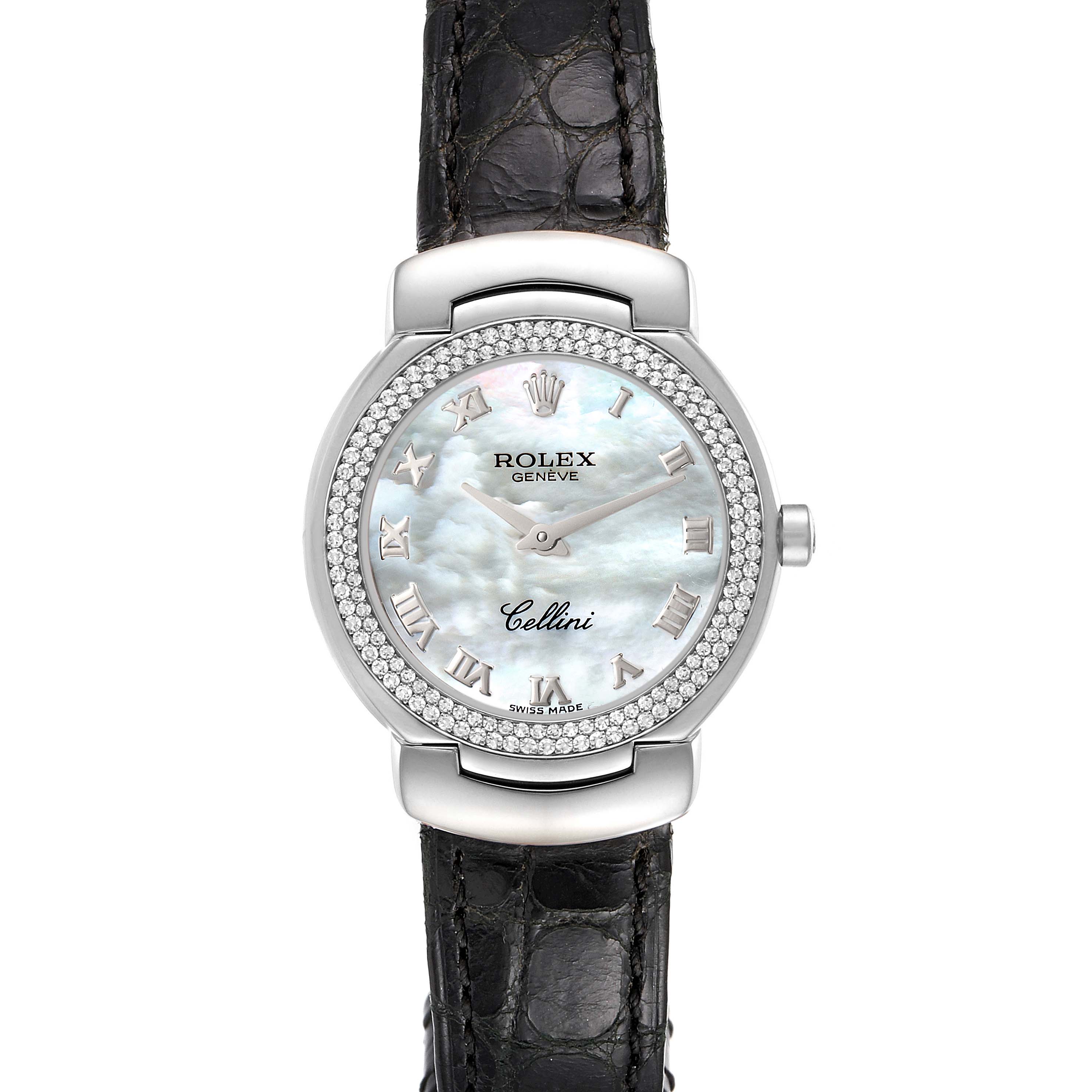 The image shows a top view of the Rolex Cellini 6671 Women's White Gold Mother of Pearl Dial 6671 Women's White Gold Mother of Pearl Dial watch, featuring its face, bezel, and black leather strap.