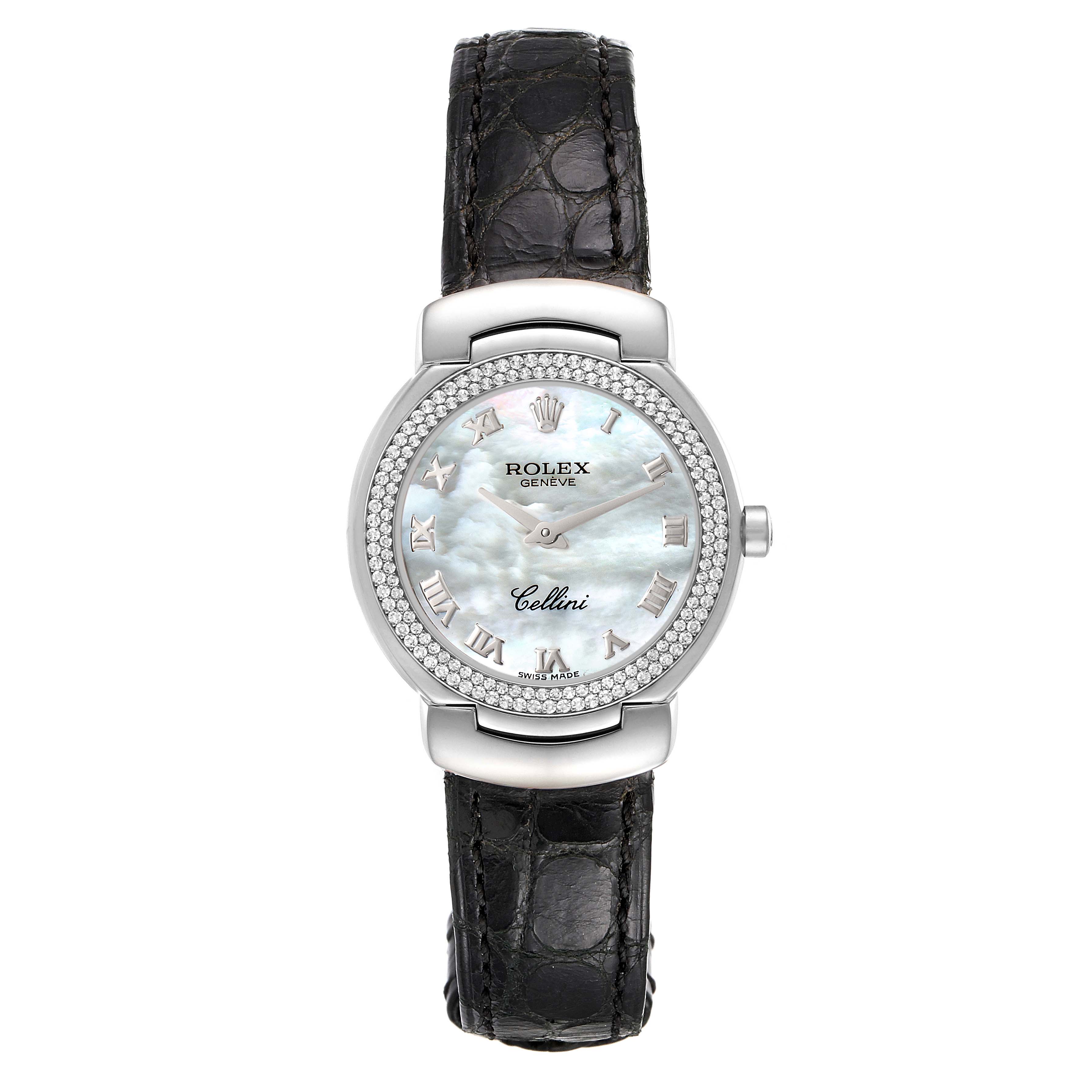 The Rolex Cellini 6671 Women's White Gold Mother of Pearl Dial 6671 Women's White Gold Mother of Pearl Dial watch, shown from the front, features a black leather strap, a diamond bezel, and a white dial with Roman numerals.