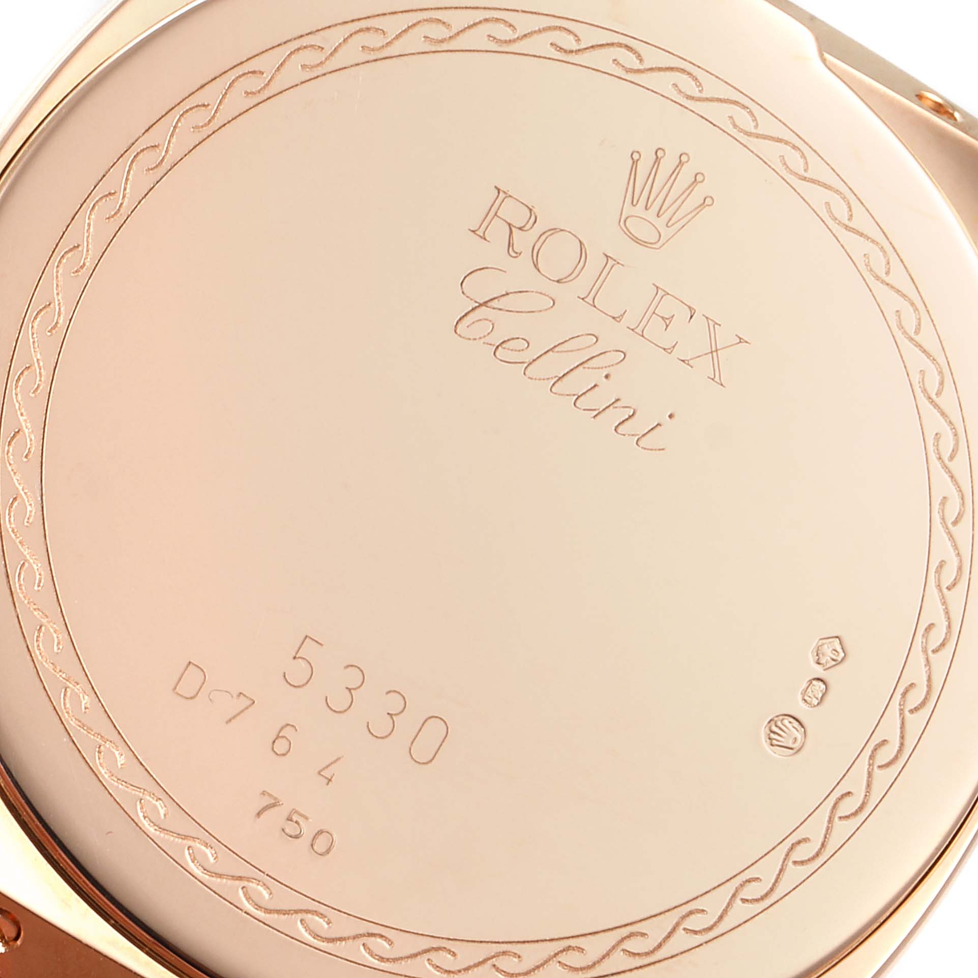 This image shows the engraved case back of a Rolex Cellini 5330 Men's Rose Gold Grey Dial 5330 Men's Rose Gold Grey Dial watch, detailing model number and decorative elements.