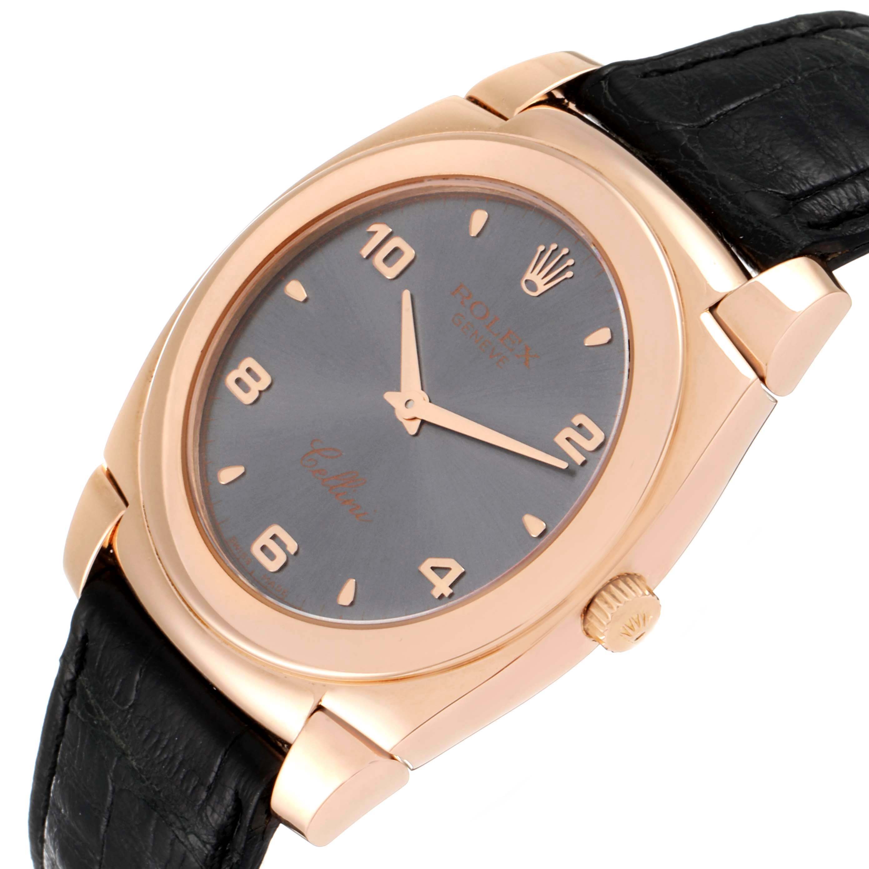 The Rolex Cellini 5330 Men's Rose Gold Grey Dial 5330 Men's Rose Gold Grey Dial watch is shown at a slightly tilted angle, featuring its face, bezel, case, crown, and part of the leather strap.