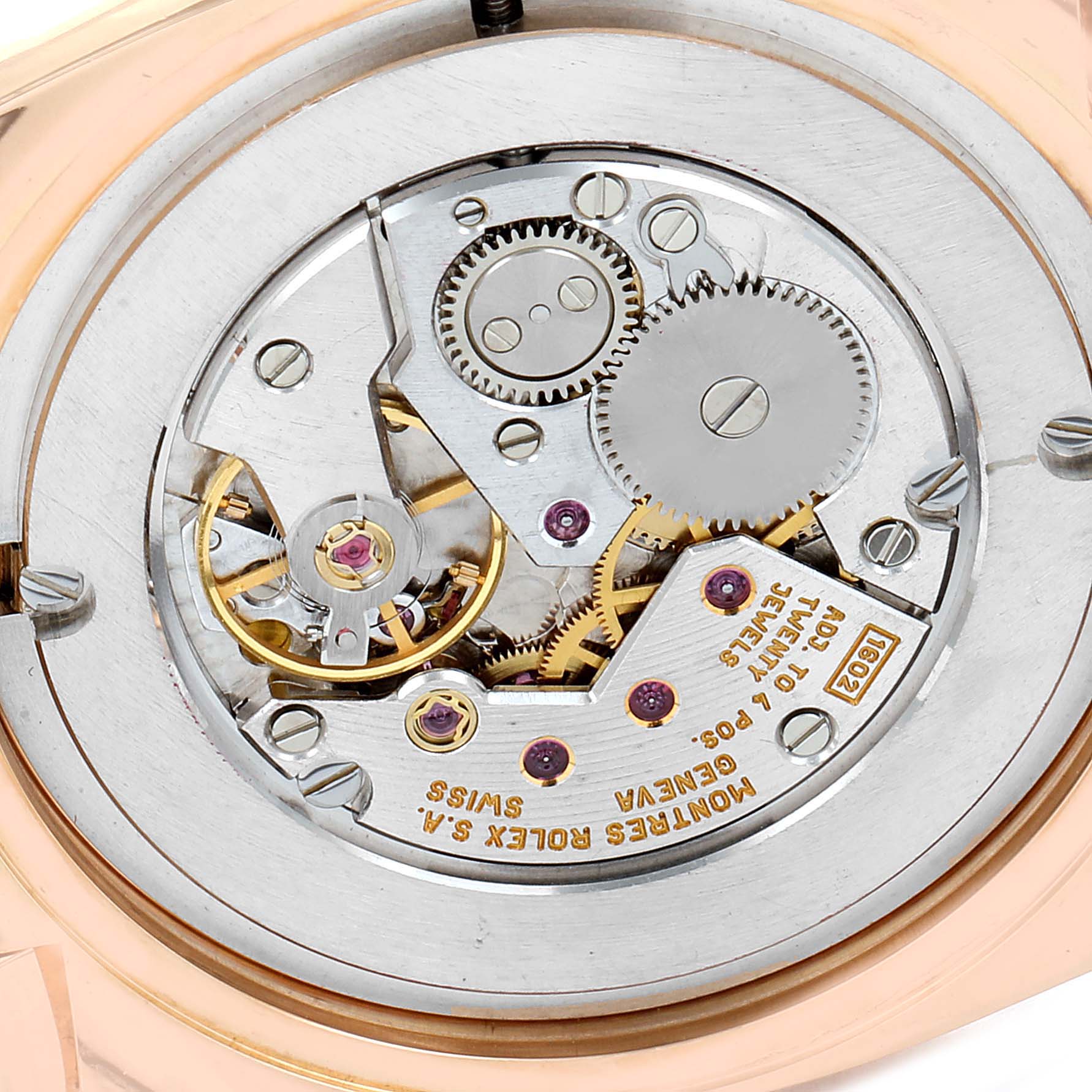 The image shows a close-up view of the movement and inner mechanical components of a Rolex Cellini 5330 Men
s Rose Gold White Dial 5330 Men
s Rose Gold White Dial model.