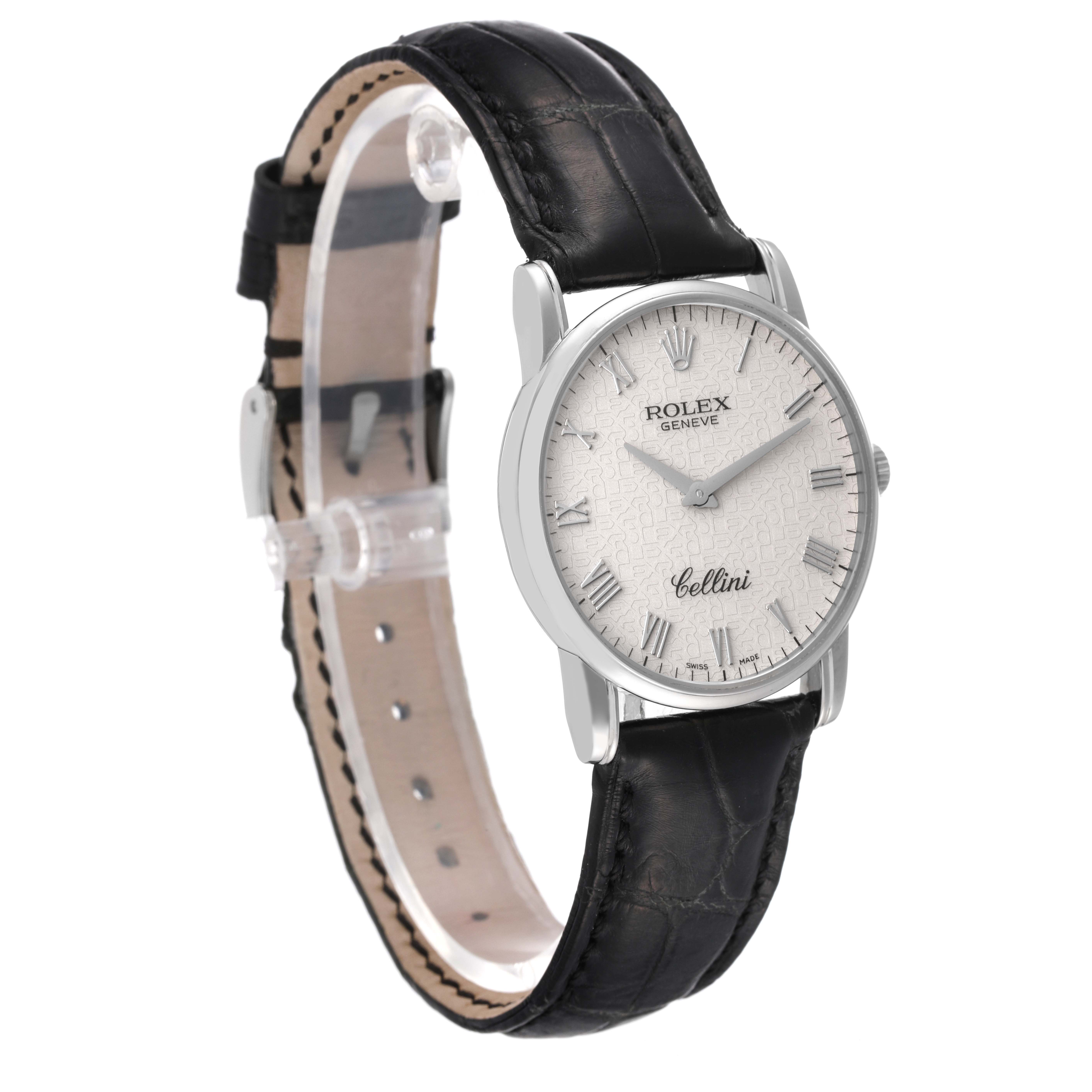 The image displays a Rolex Cellini 5116 Men's White Gold Beige Dial 5116 Men's White Gold Beige Dial watch from a side angle, showing its black leather strap and silver dial with Roman numerals.