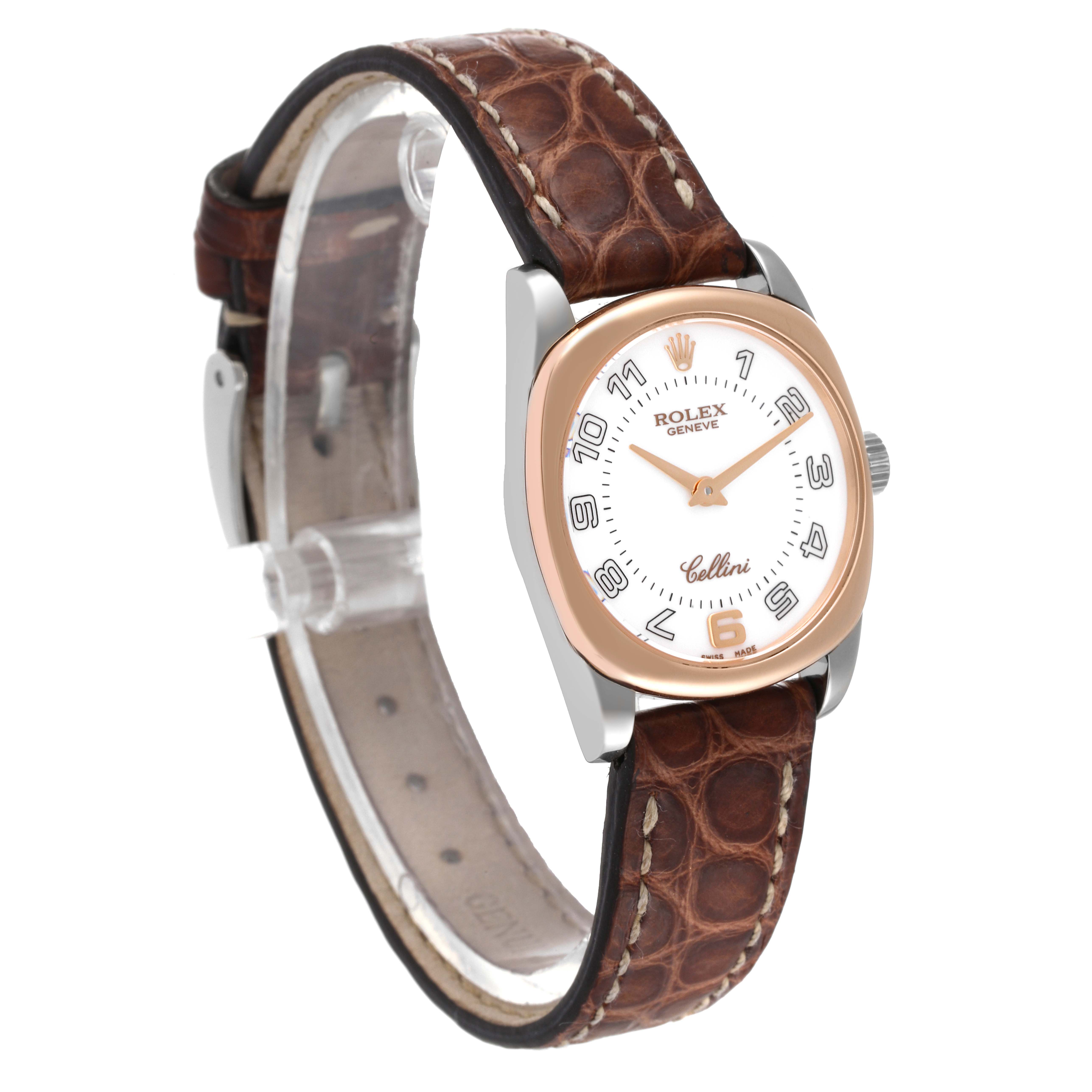 The Rolex Cellini 6229 Women
s Steel and Gold (two tone) White Dial 6229 Women
s Steel and Gold (two tone) White Dial watch is shown at a slight side angle, featuring a brown leather strap and a round rose-gold bezel.