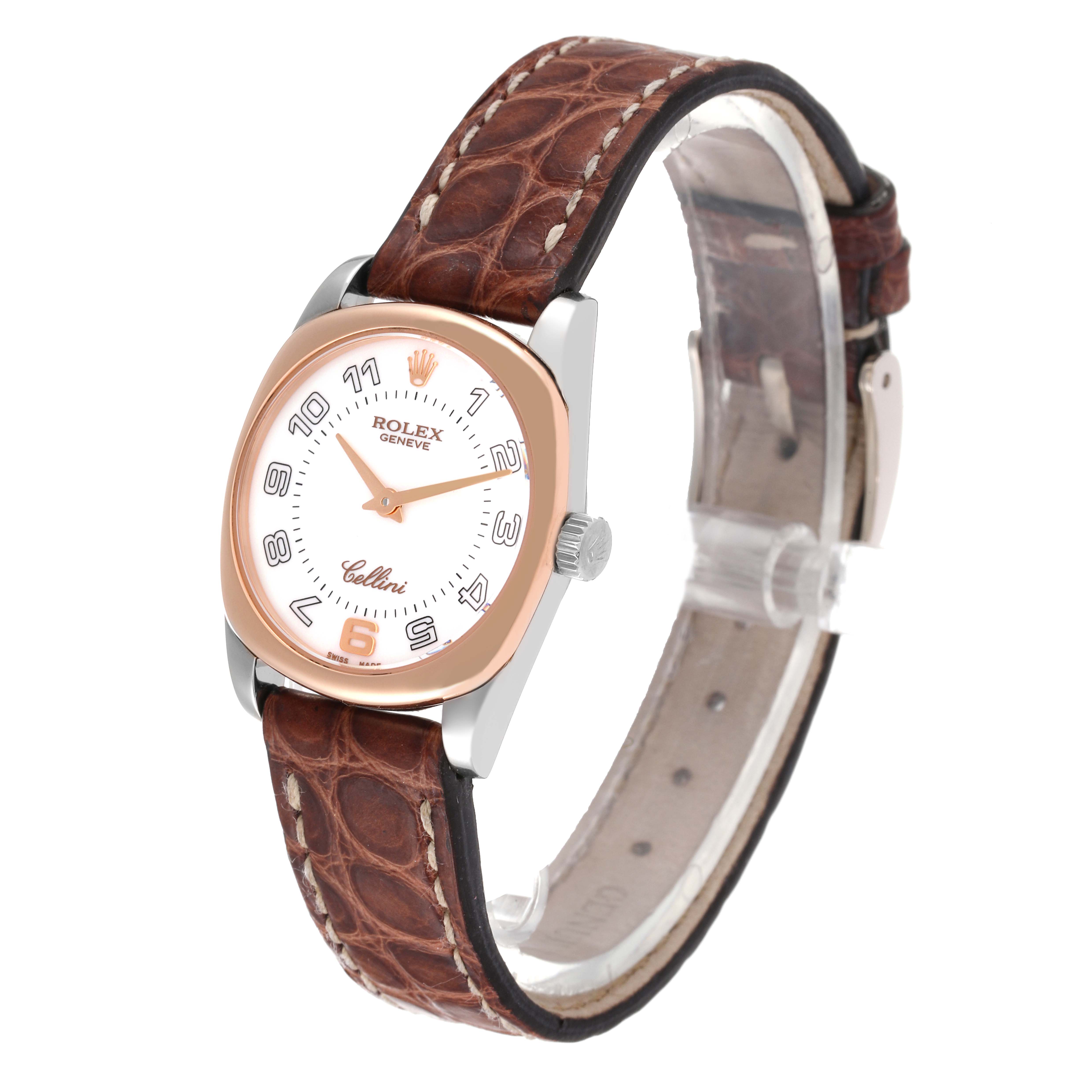 This image shows a close-up, three-quarter angle view of the Rolex Cellini 6229 Women
s Steel and Gold (two tone) White Dial 6229 Women
s Steel and Gold (two tone) White Dial watch featuring a brown leather strap and rose gold and stainless steel case.