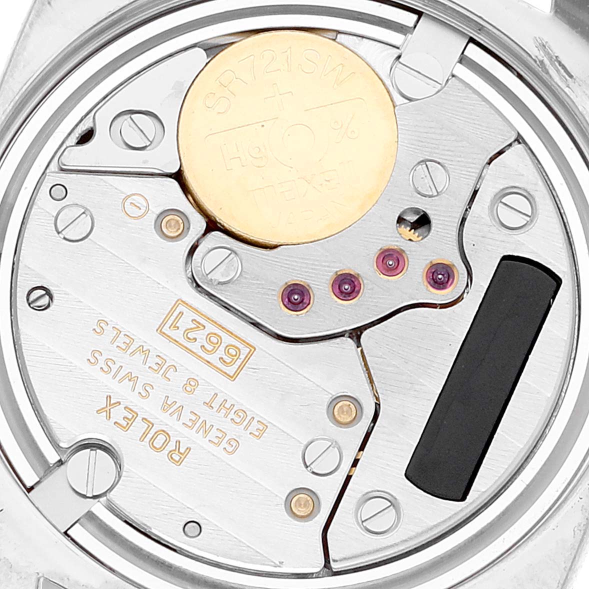 The image shows the movement mechanism of a Rolex Cellini 6229 Women
s Steel and Gold (two tone) White Dial 6229 Women
s Steel and Gold (two tone) White Dial watch, including the battery and various gears from a top-down angle.