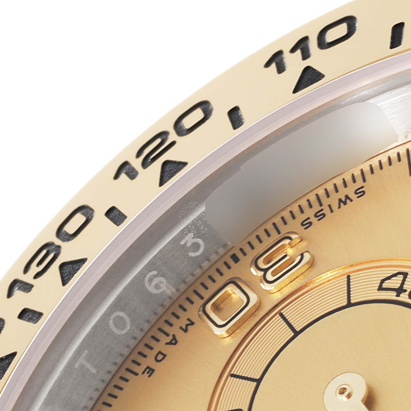 This close-up shows the bezel and part of the dial of the Rolex Daytona 116503 Men's Steel and Gold (two tone) Champagne Dial 116503 Men's Steel and Gold (two tone) Champagne Dial watch.